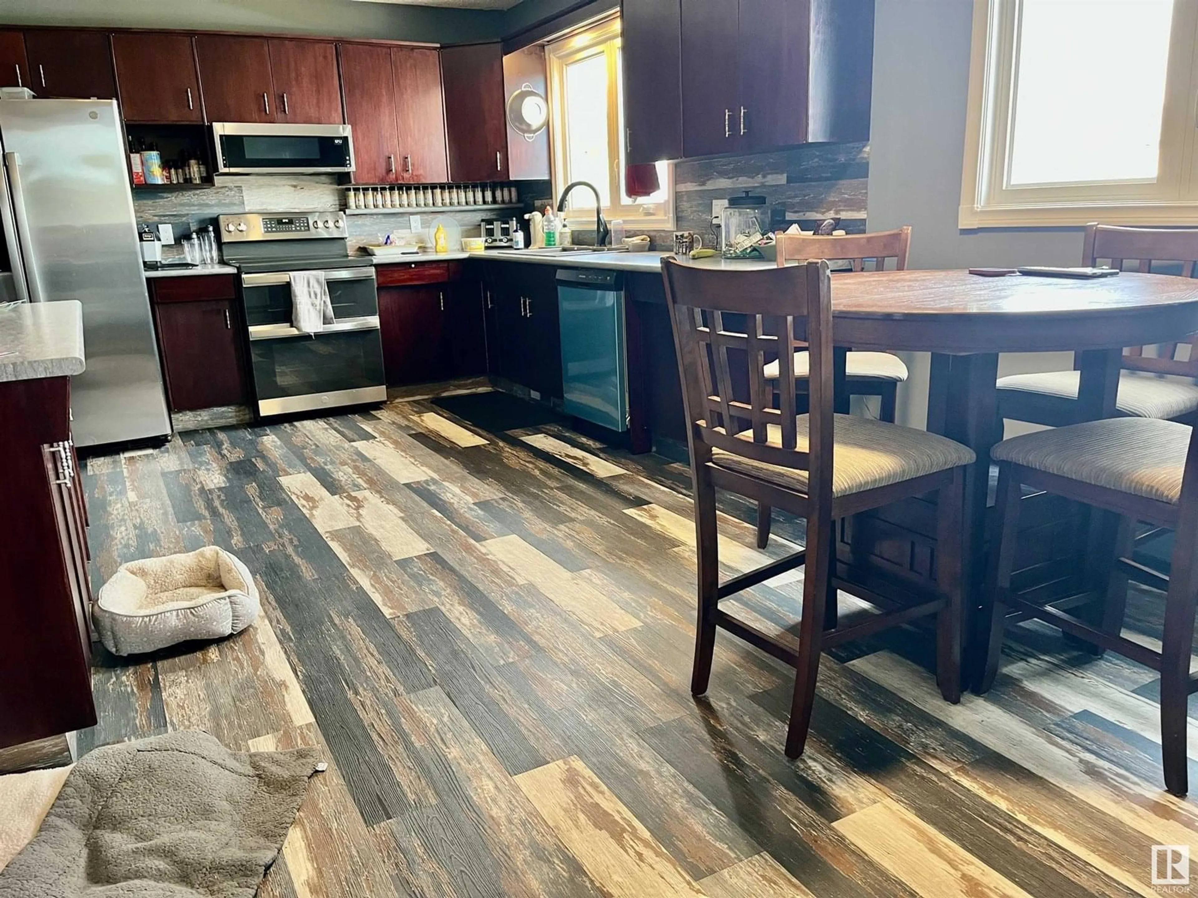 Open concept kitchen, wood/laminate floor for 4505 55 AV, Smoky Lake Town Alberta T0Z3C0