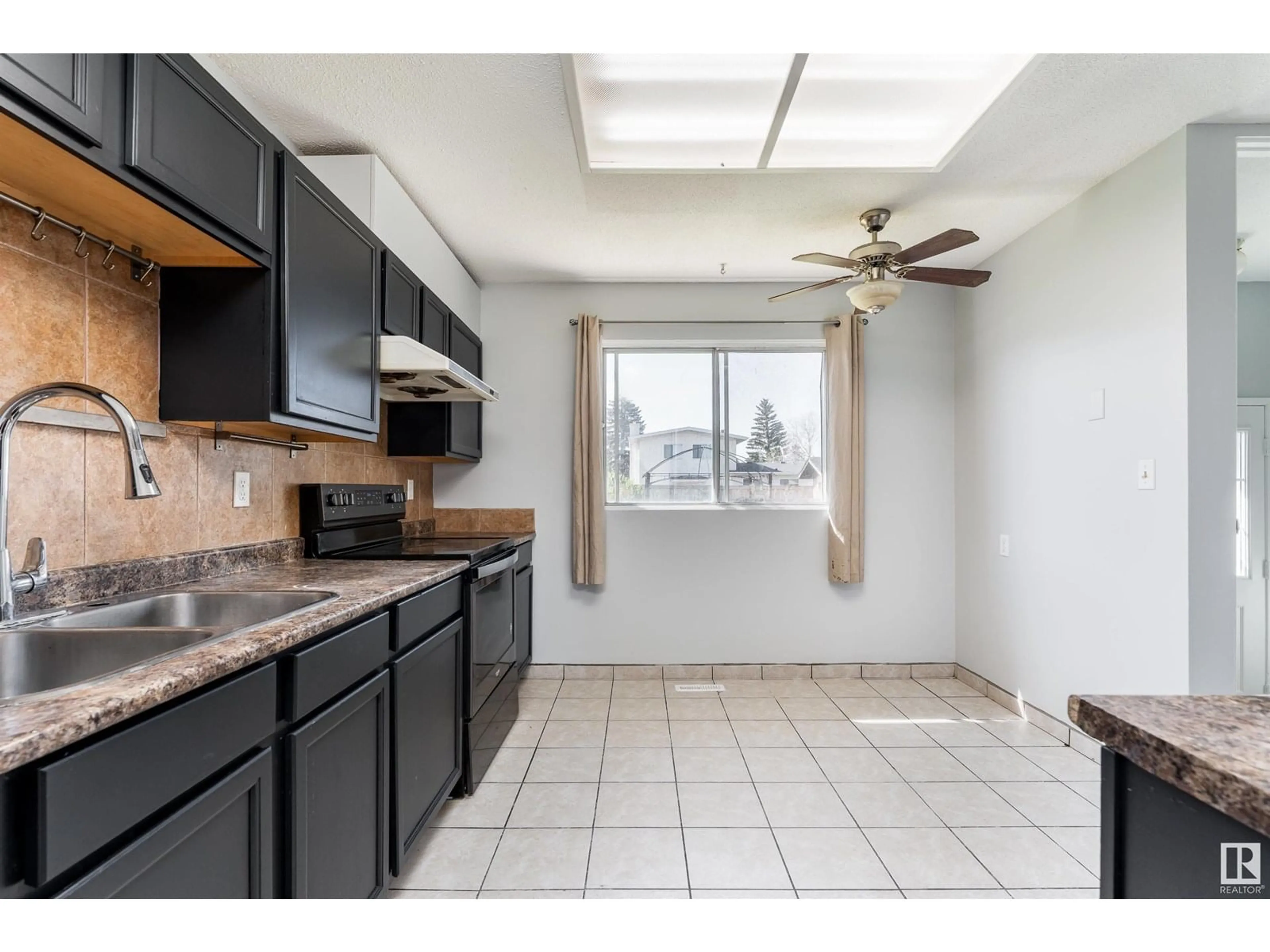 Standard kitchen, ceramic/tile floor for NW - 9915 170 AV, Edmonton Alberta T5X3G3