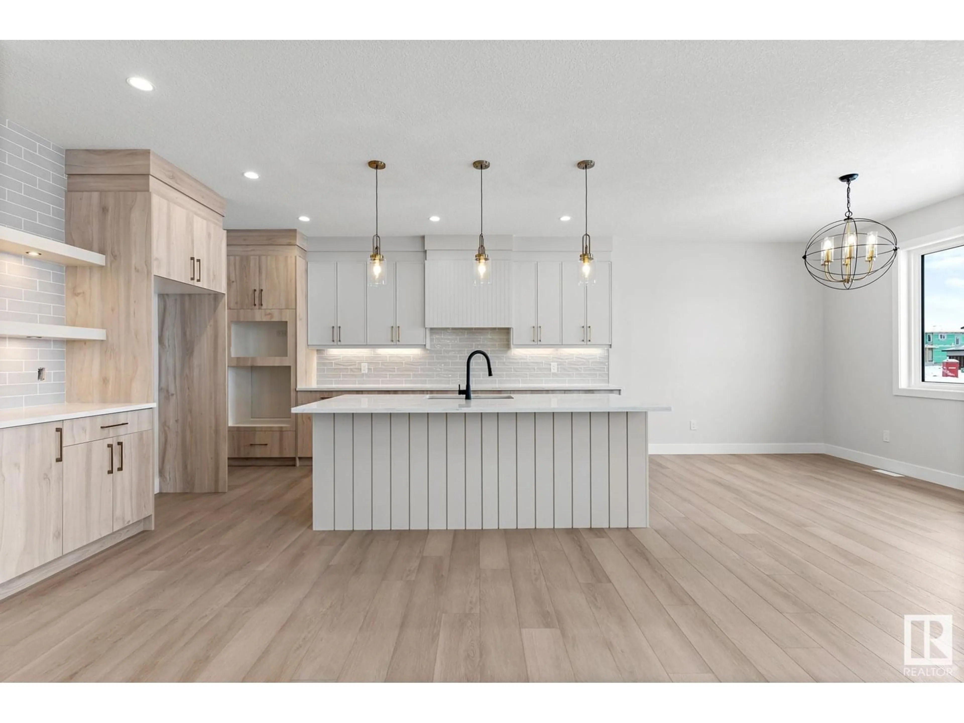 Open concept kitchen, wood/laminate floor for 66 HEMINGWAY CRESCENT, Spruce Grove Alberta T7X2L6