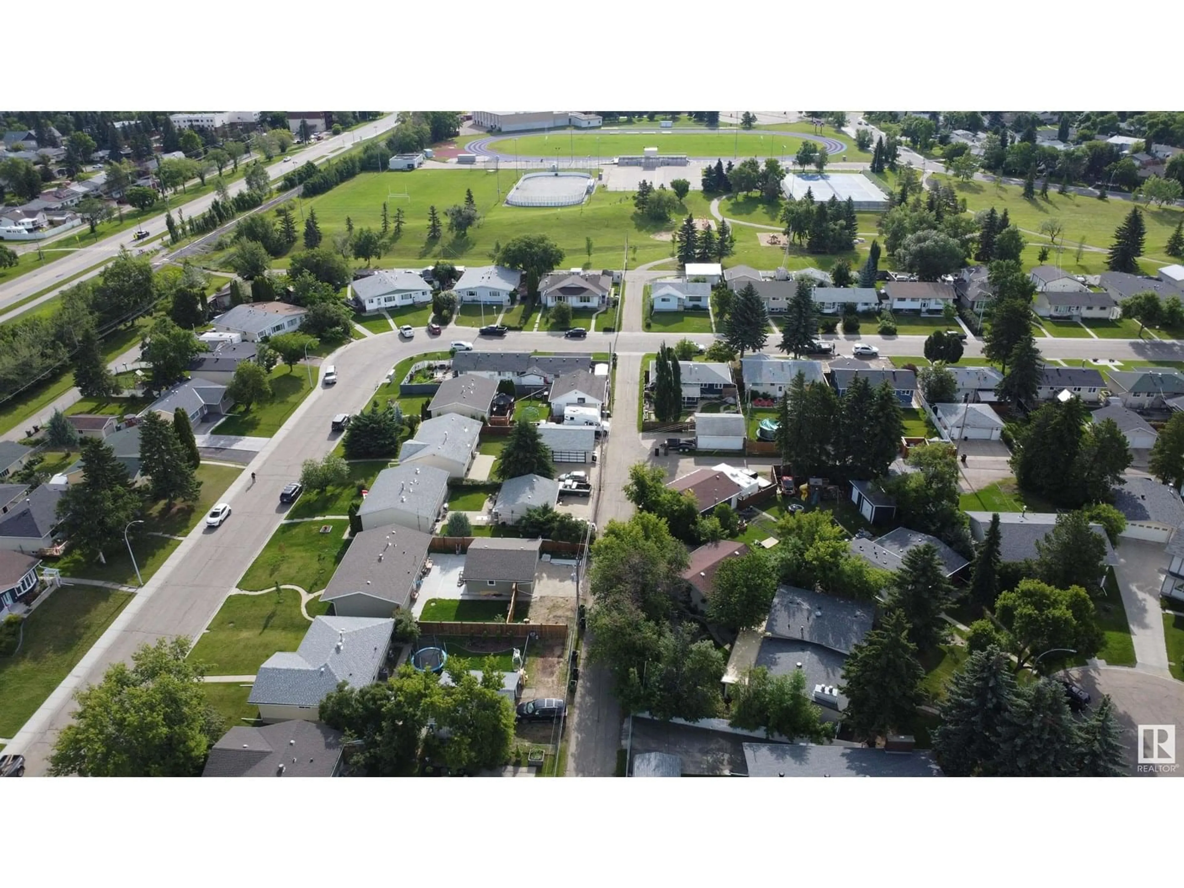 A pic from outside/outdoor area/front of a property/back of a property/a pic from drone, street for 21 CAMELOT AV, Leduc Alberta T9E4M4