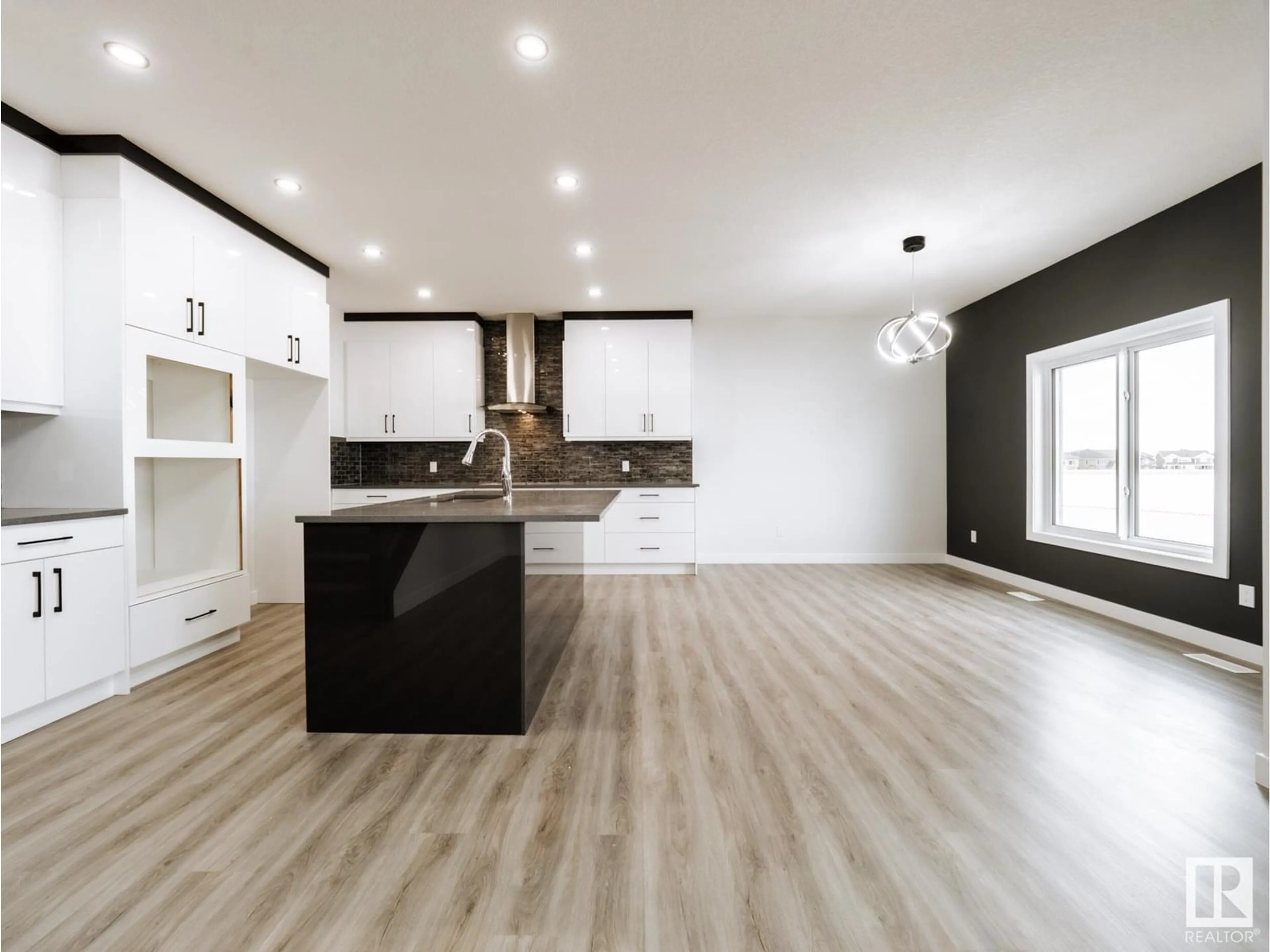 Open concept kitchen, wood/laminate floor for 96 ELDRIDGE POINT, St. Albert Alberta T8N8C4