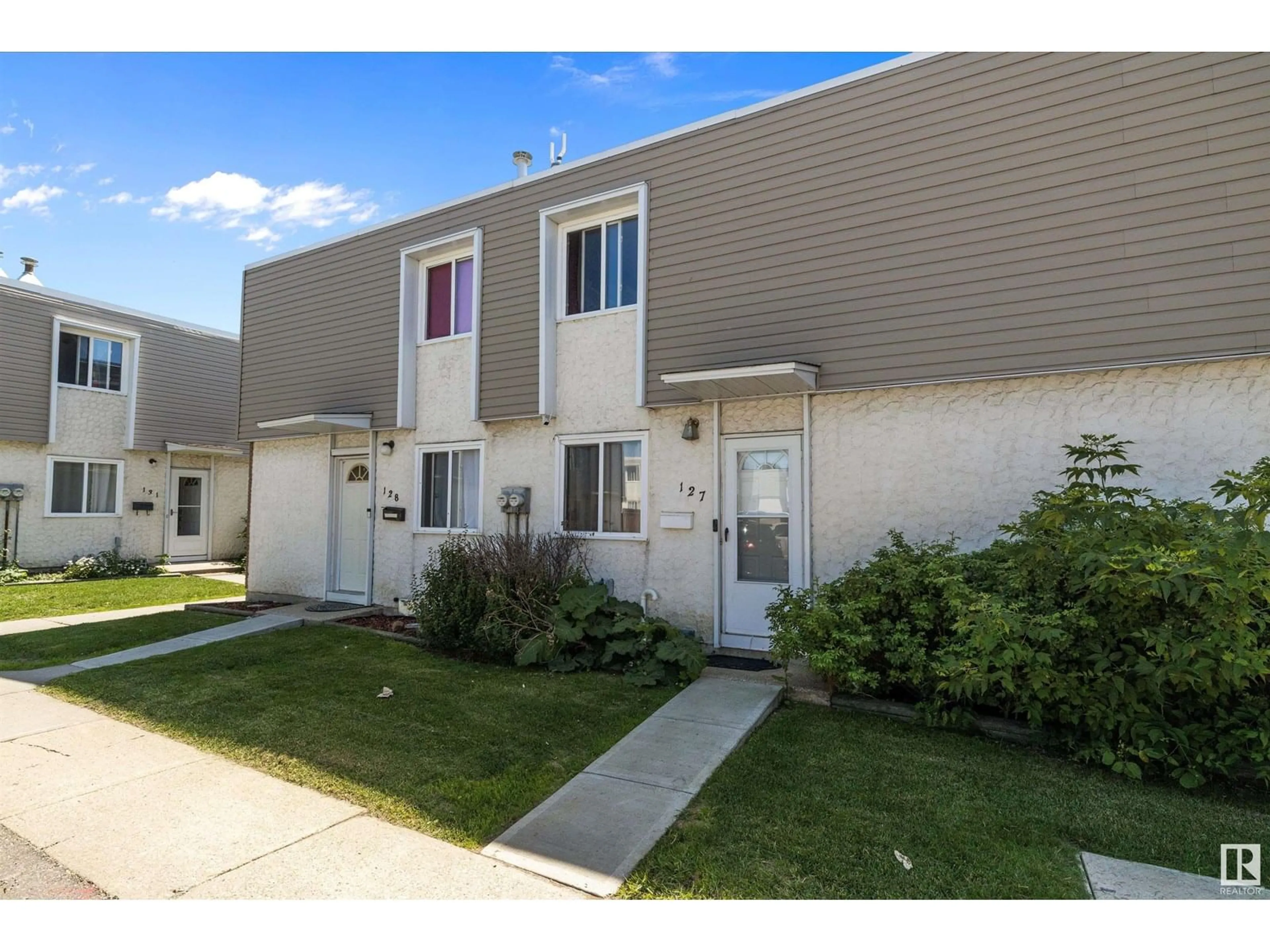 Home with vinyl exterior material, street for NW - 127 CORNELL CO, Edmonton Alberta T5C3C3