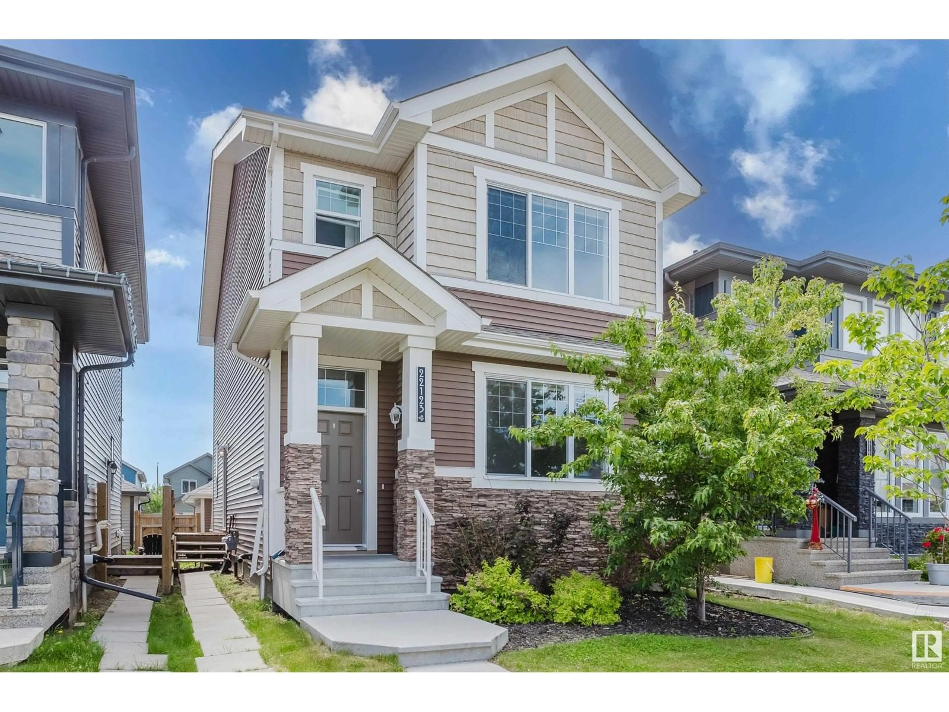 Home with brick exterior material, street for NW - 22123 89 AV, Edmonton Alberta T5T7G9