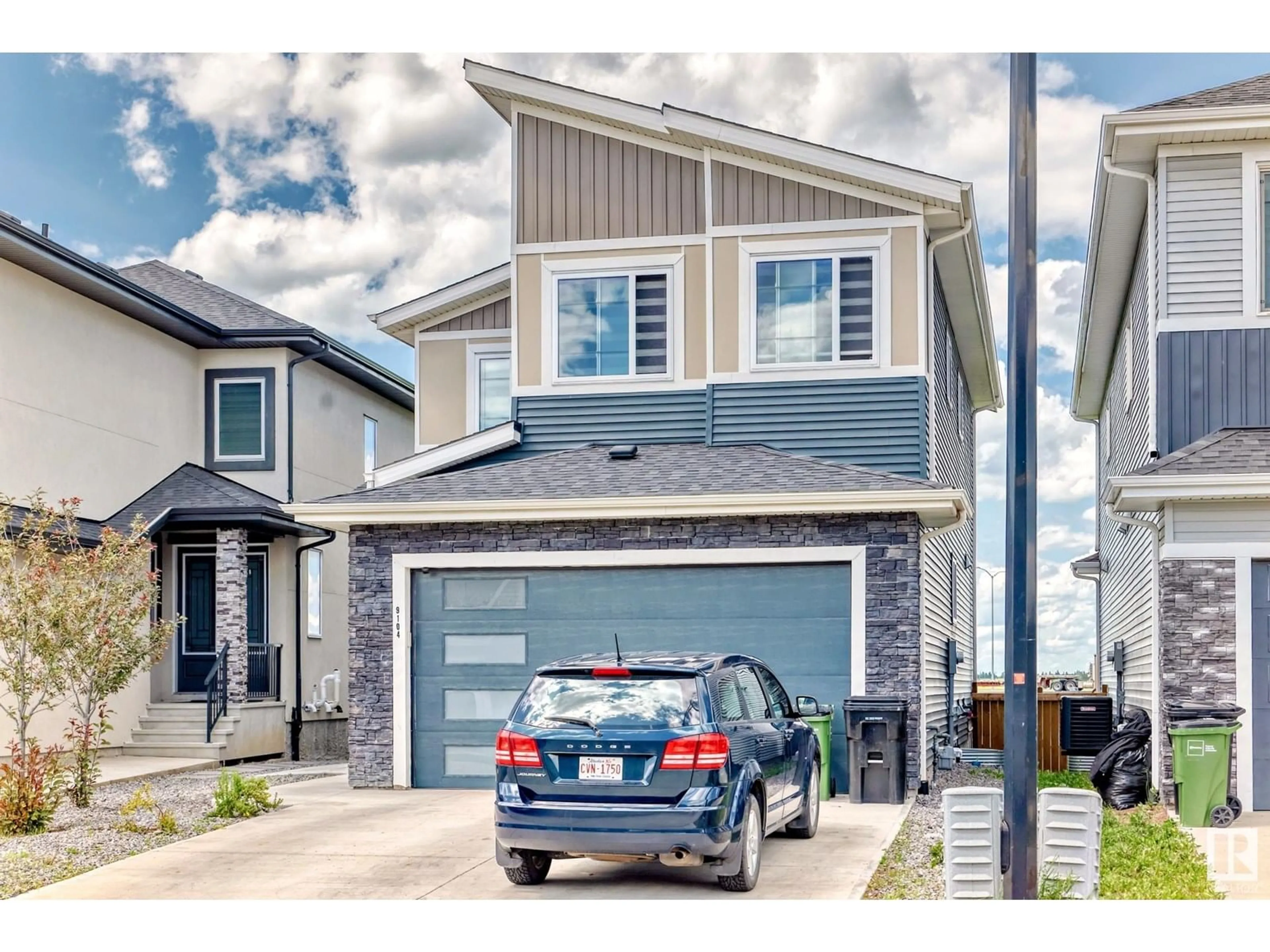 Home with vinyl exterior material, street for NW - 9104 183 AV, Edmonton Alberta T5Z0S6