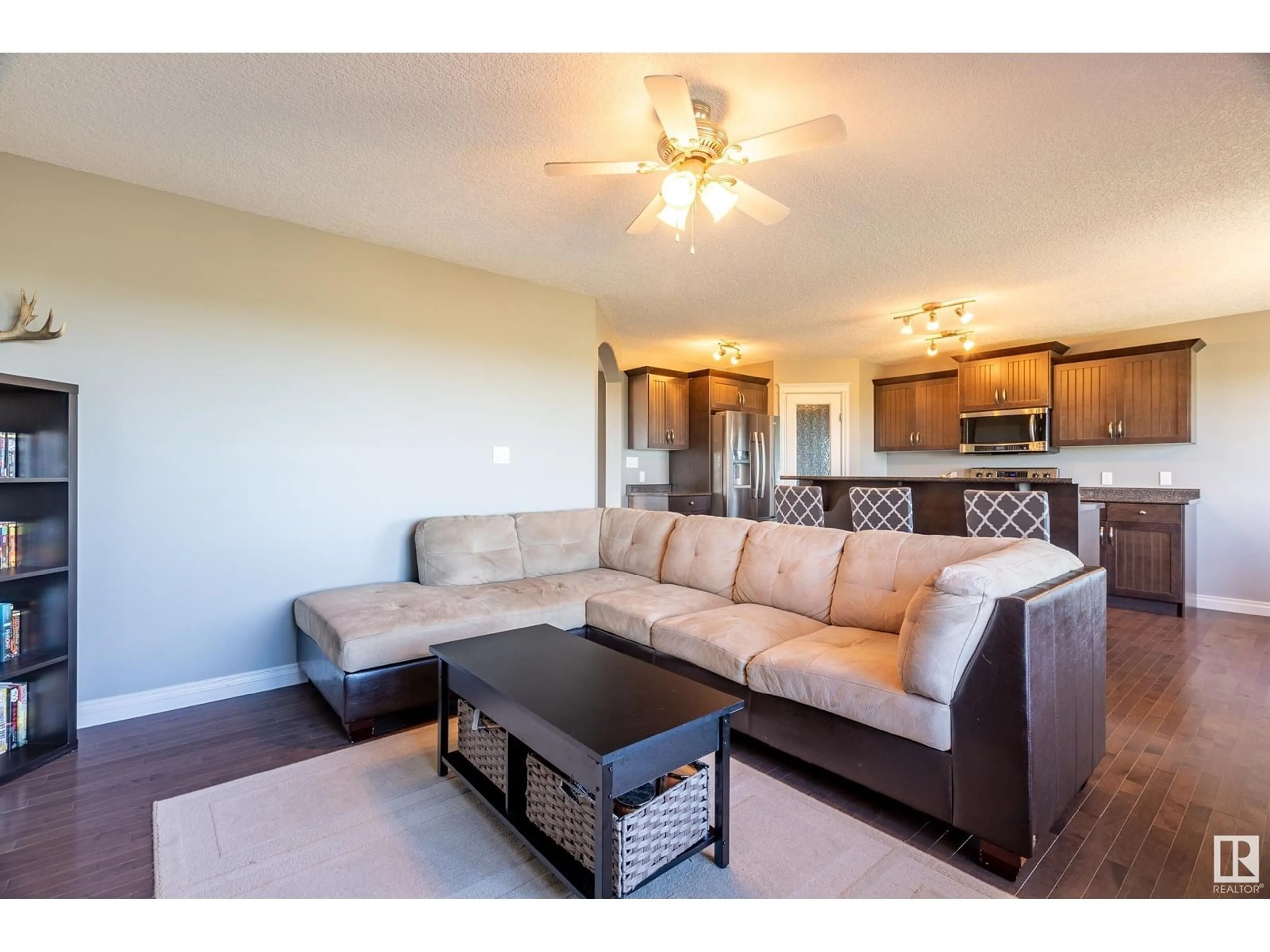 Living room with furniture, wood/laminate floor for 5118 53A AV, Legal Alberta T0G1L0