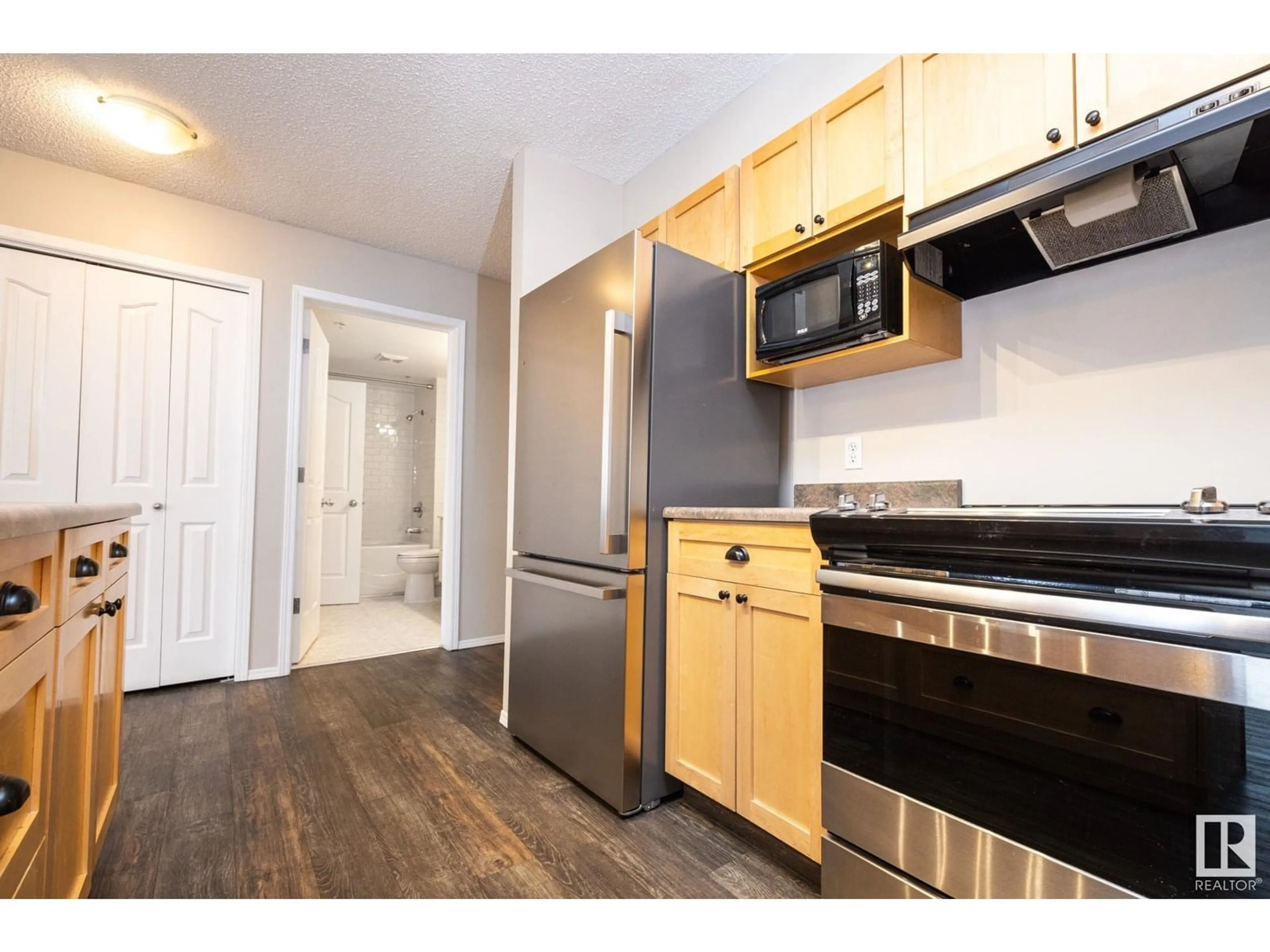 Standard kitchen, wood/laminate floor for #406 - 10311 111 ST NW, Edmonton Alberta T5K2Y8