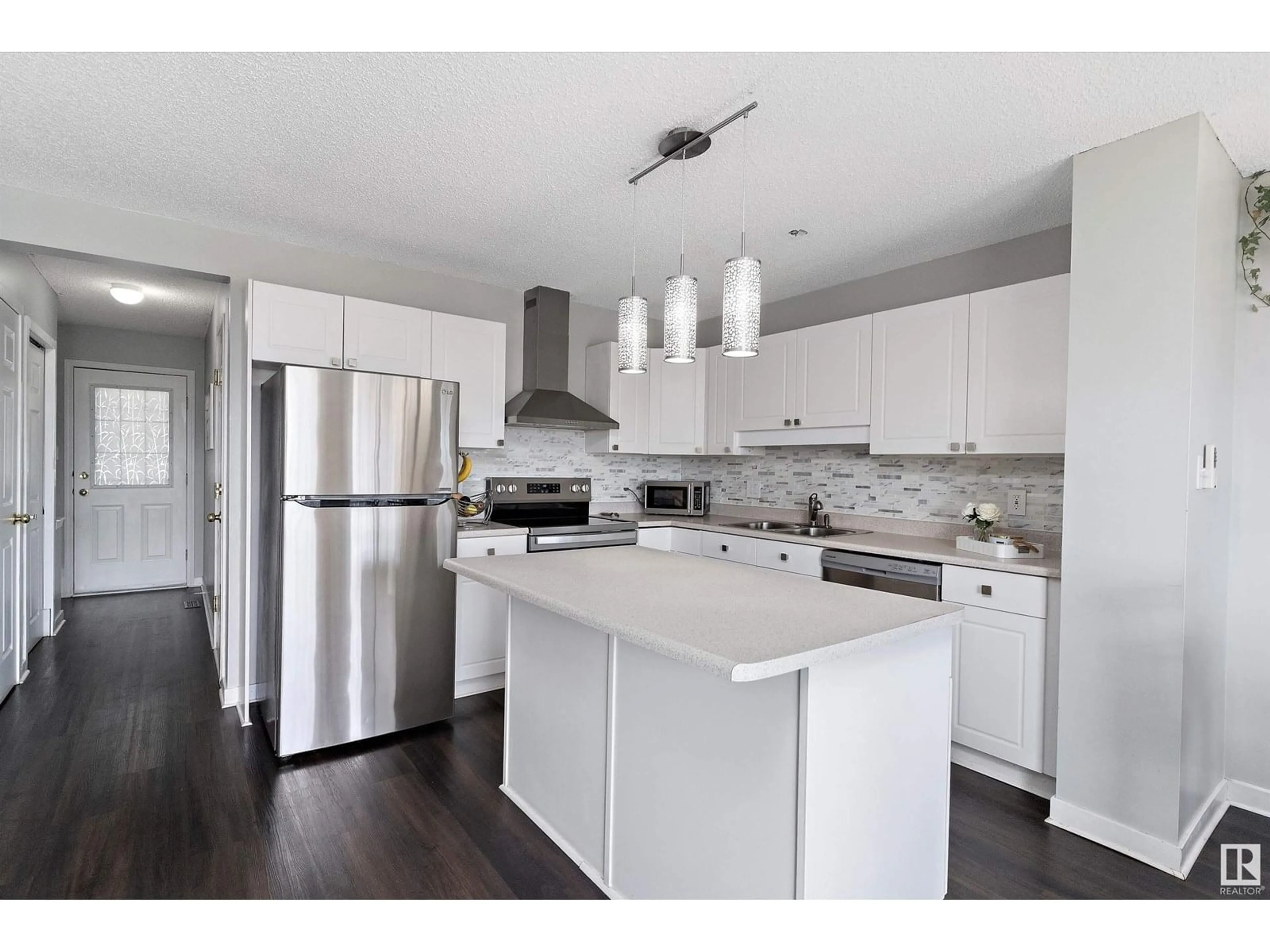 Open concept kitchen, unknown for 14803 - 21 MILLER BV, Edmonton Alberta T5Y3A4