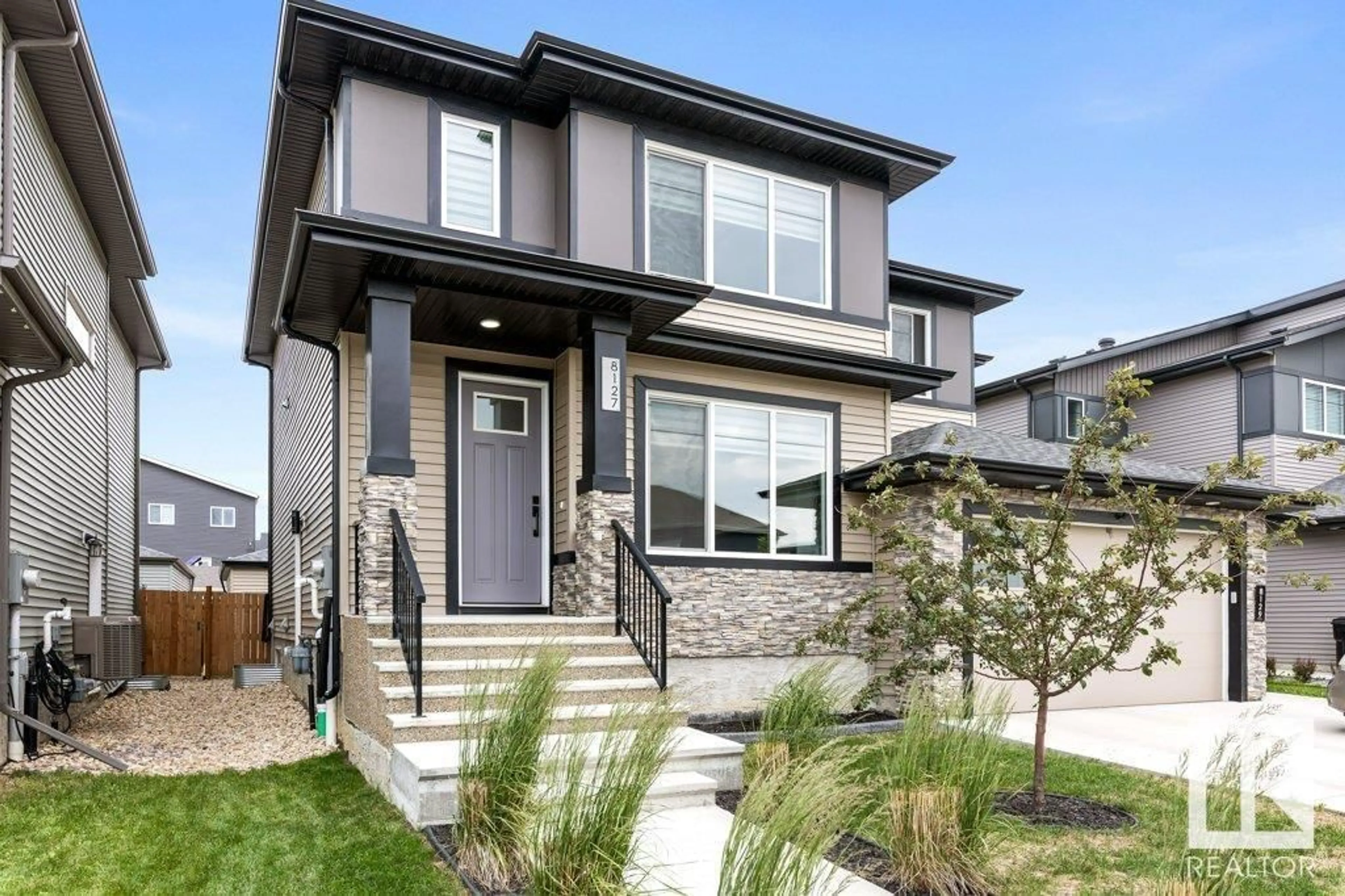Home with vinyl exterior material, street for SW - 8127 ORCHARDS GREEN GR, Edmonton Alberta T6X2N5