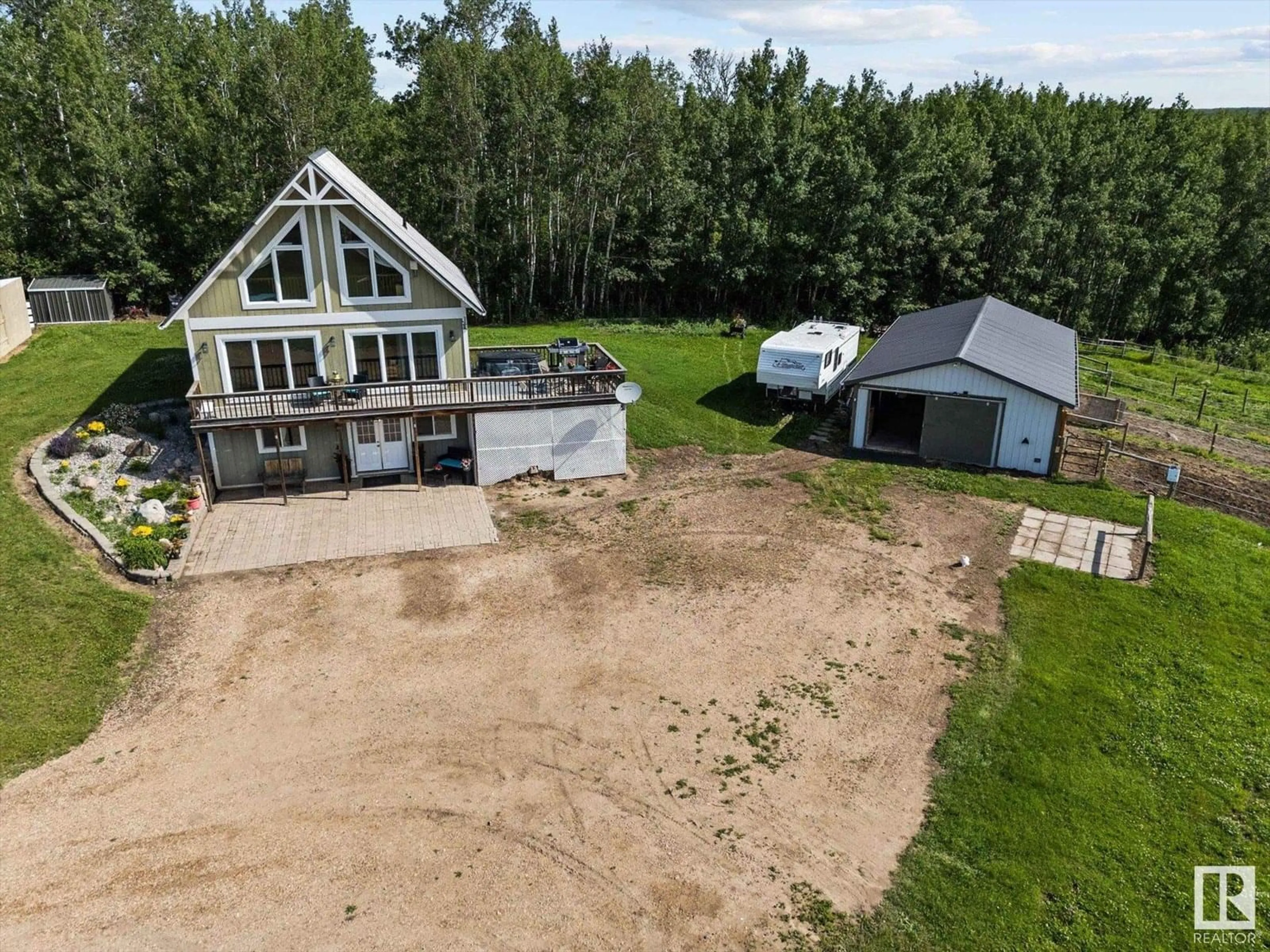 A pic from outside/outdoor area/front of a property/back of a property/a pic from drone, unknown for 56015 RGE RD 13, Rural Lac Ste. Anne County Alberta T0E1V0