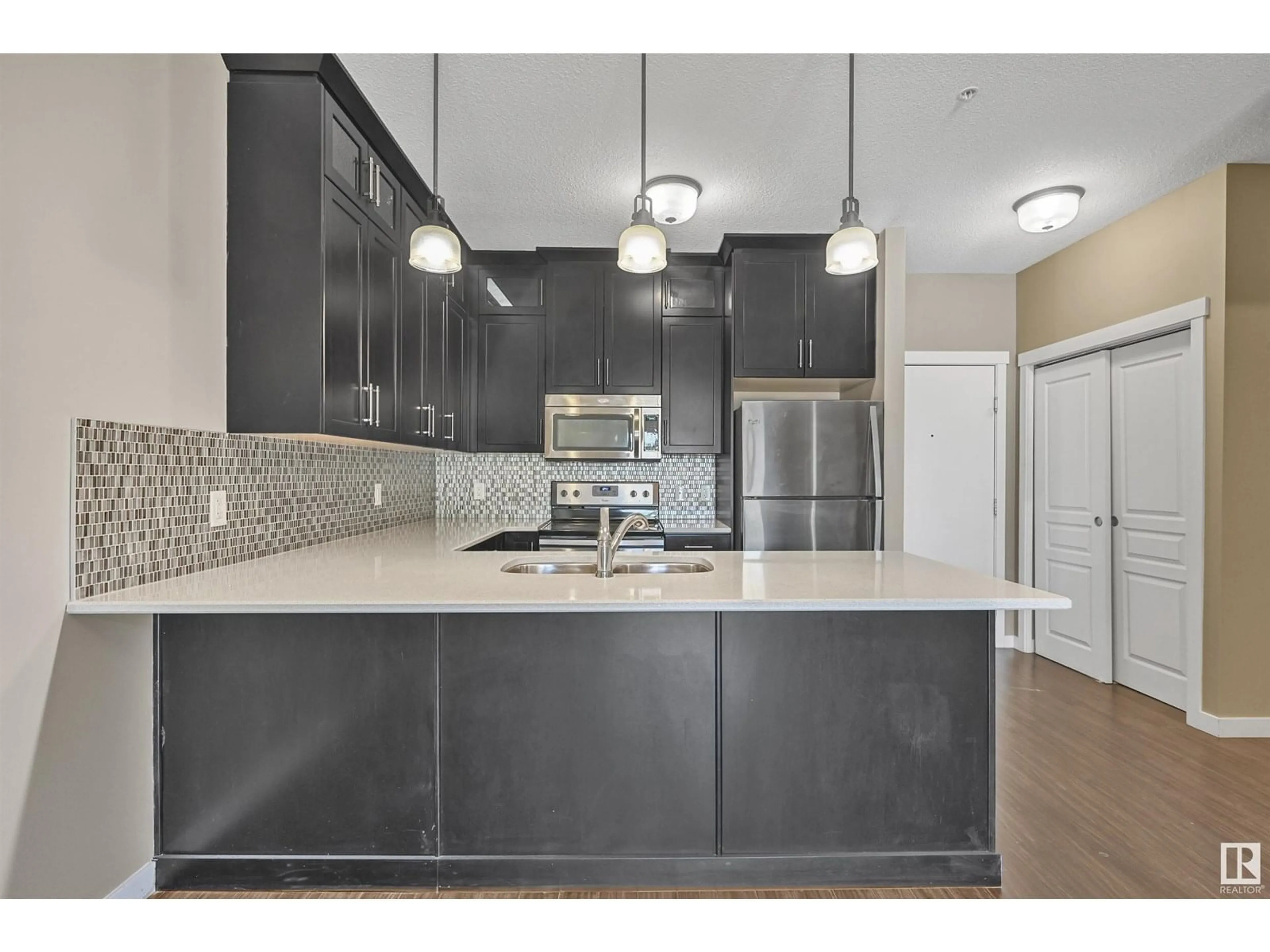 Open concept kitchen, unknown for #108 - 812 WELSH DR, Edmonton Alberta T6X1Y7