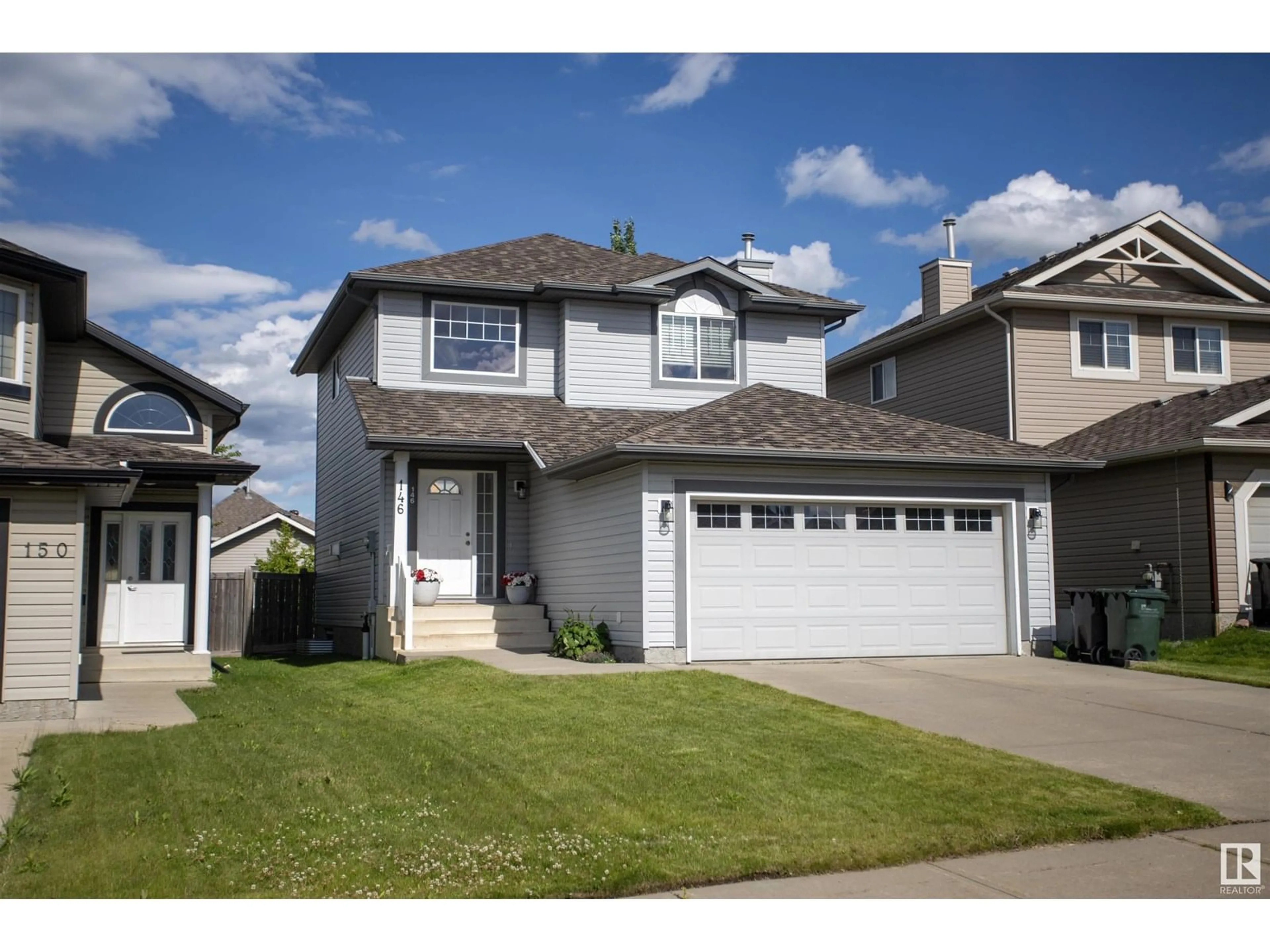 Home with vinyl exterior material, street for 146 CHESTERMERE CR, Sherwood Park Alberta T8N2W5