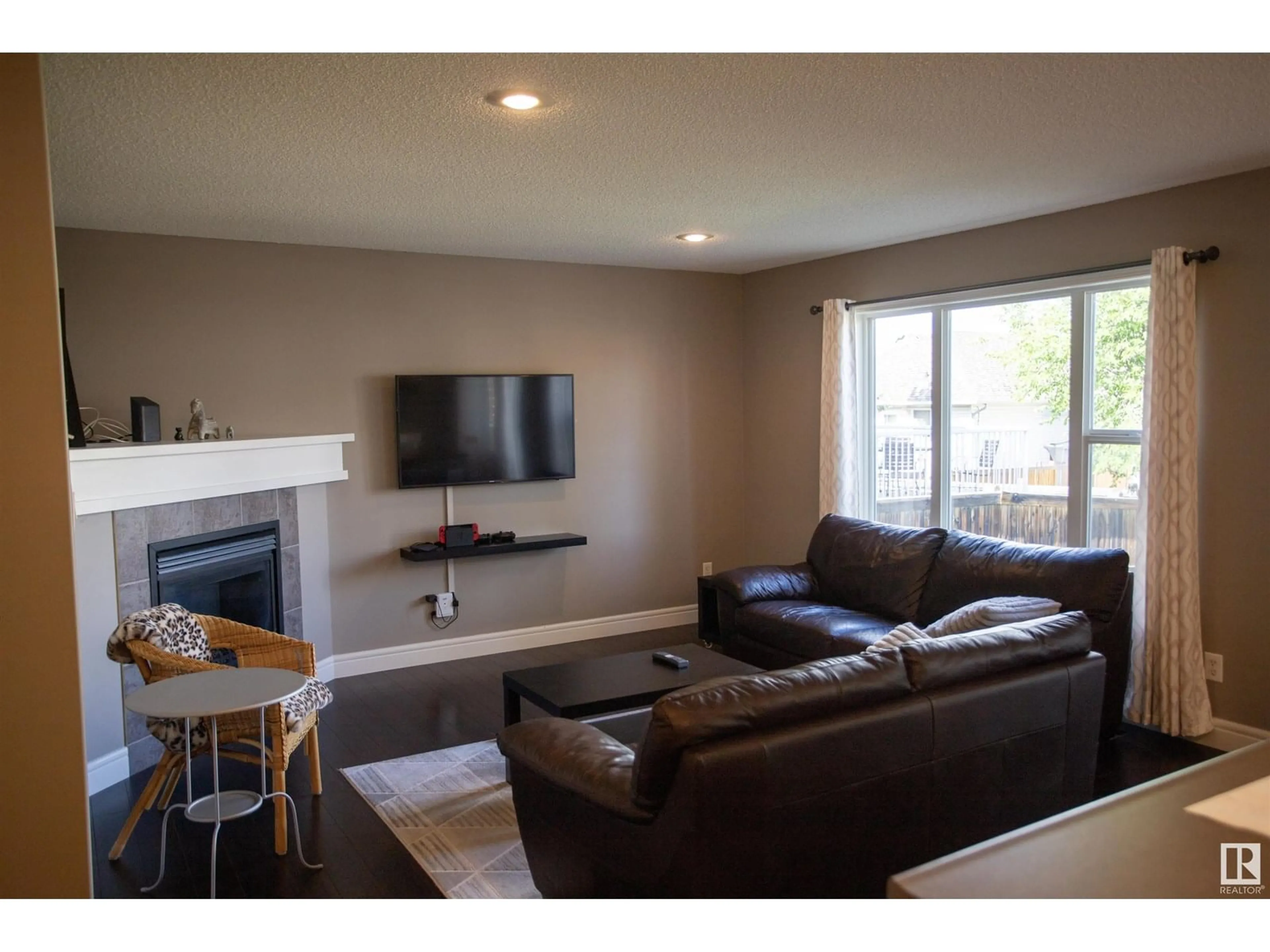Living room with furniture, wood/laminate floor for 146 CHESTERMERE CR, Sherwood Park Alberta T8N2W5