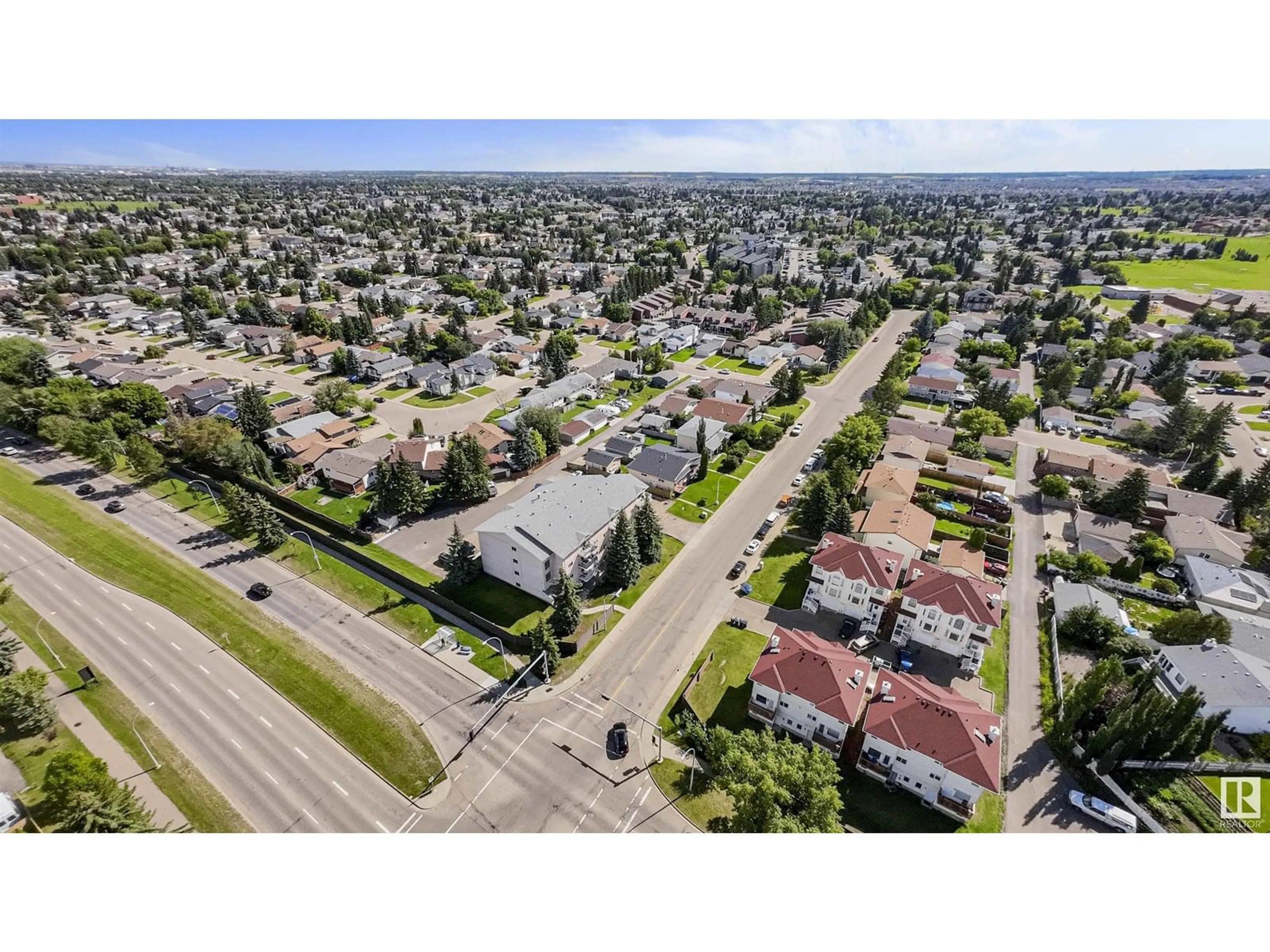 A pic from outside/outdoor area/front of a property/back of a property/a pic from drone, street for 401 - 4924 19 AV, Edmonton Alberta T6L4B5
