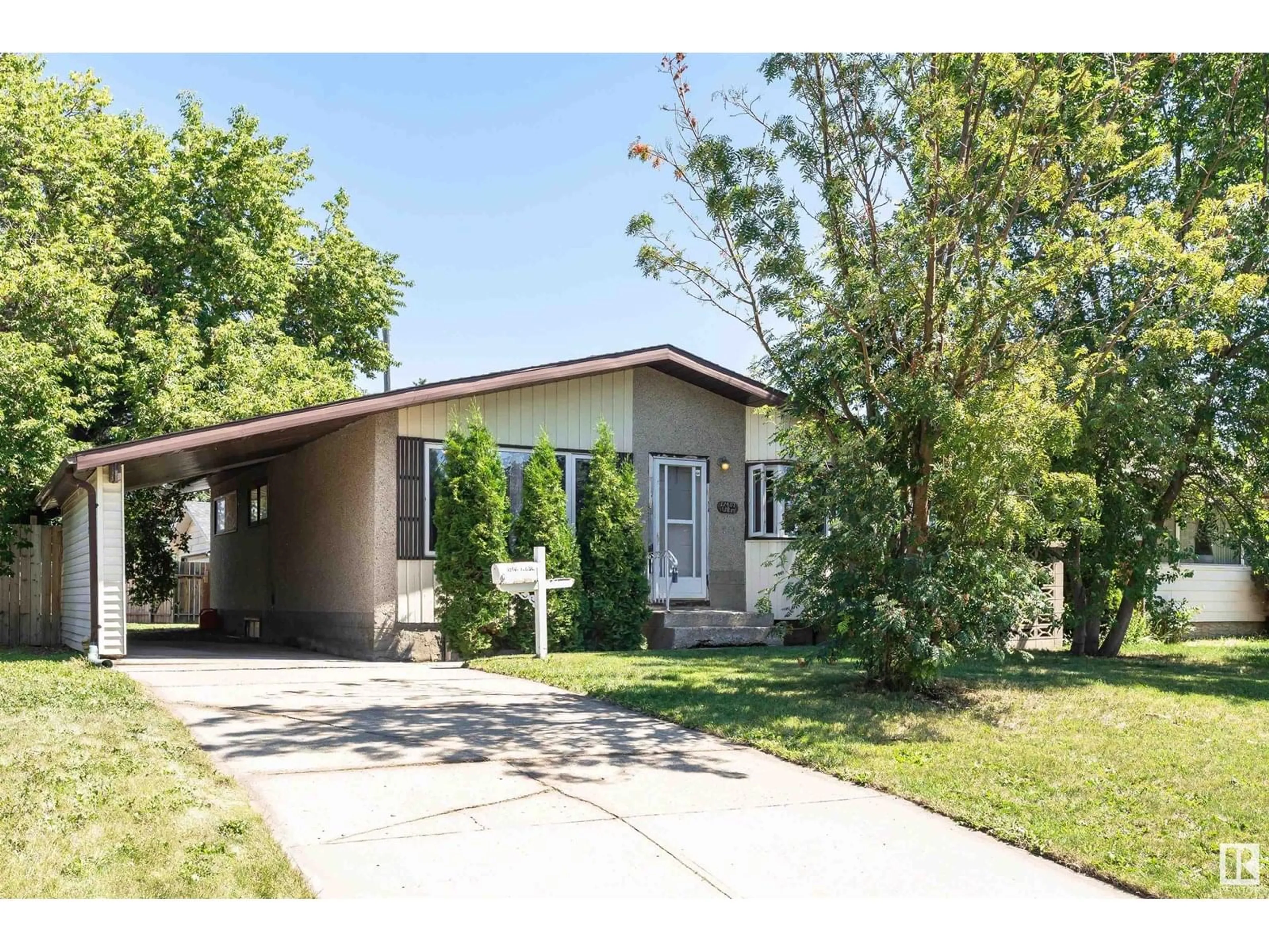 Home with vinyl exterior material, street for NW - 13407 138 ST, Edmonton Alberta T5L2C3