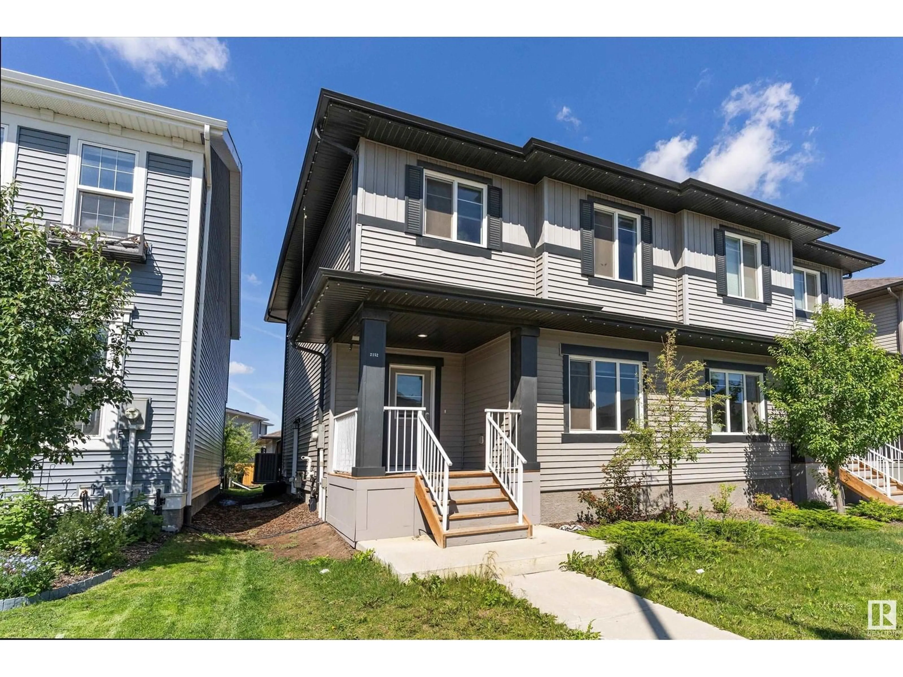 Home with vinyl exterior material, street for 2152 MAPLE RD, Edmonton Alberta T6T2L4