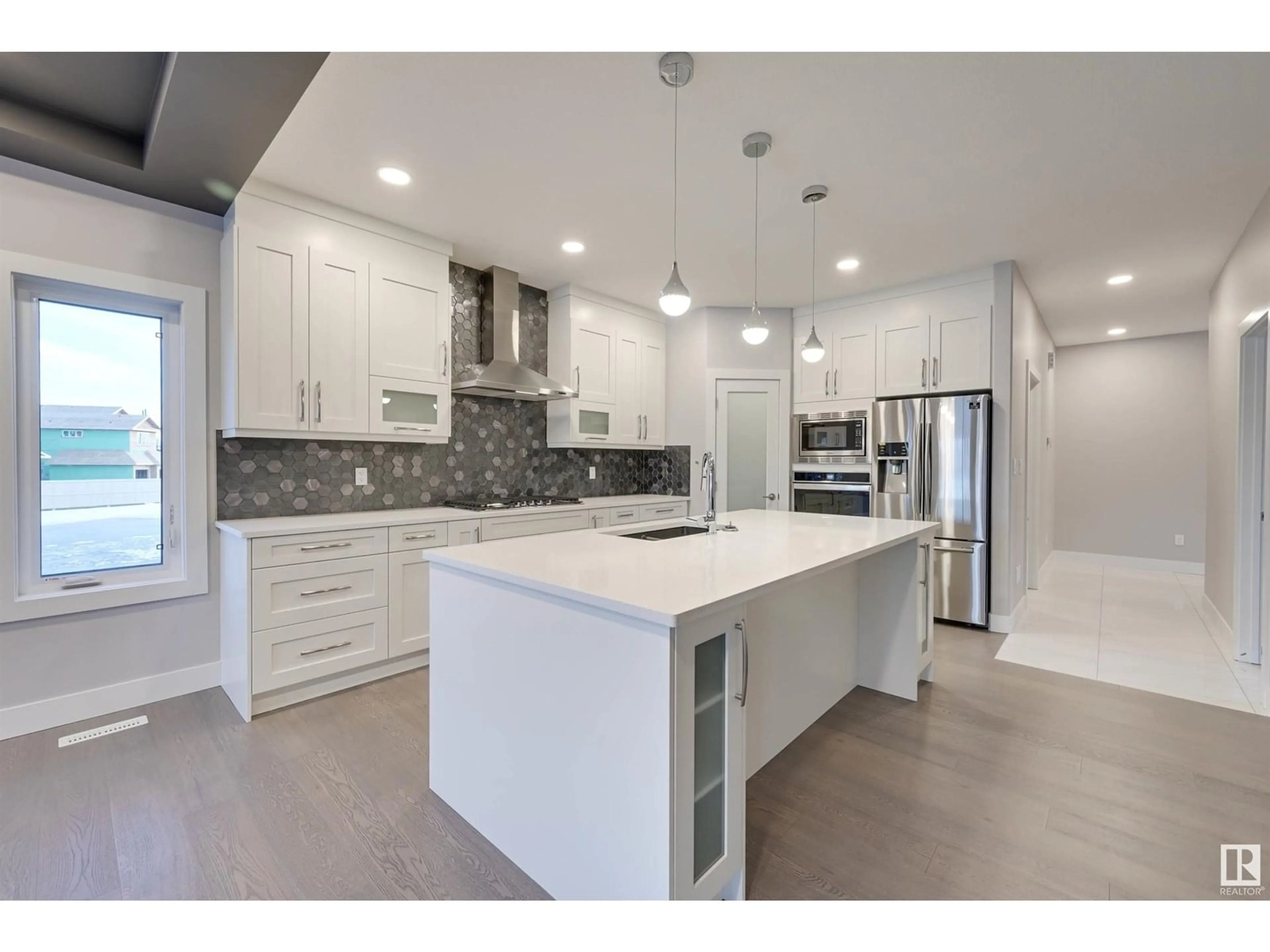 Open concept kitchen, ceramic/tile floor for 28 CANNES CV, St. Albert Alberta T8T2C6