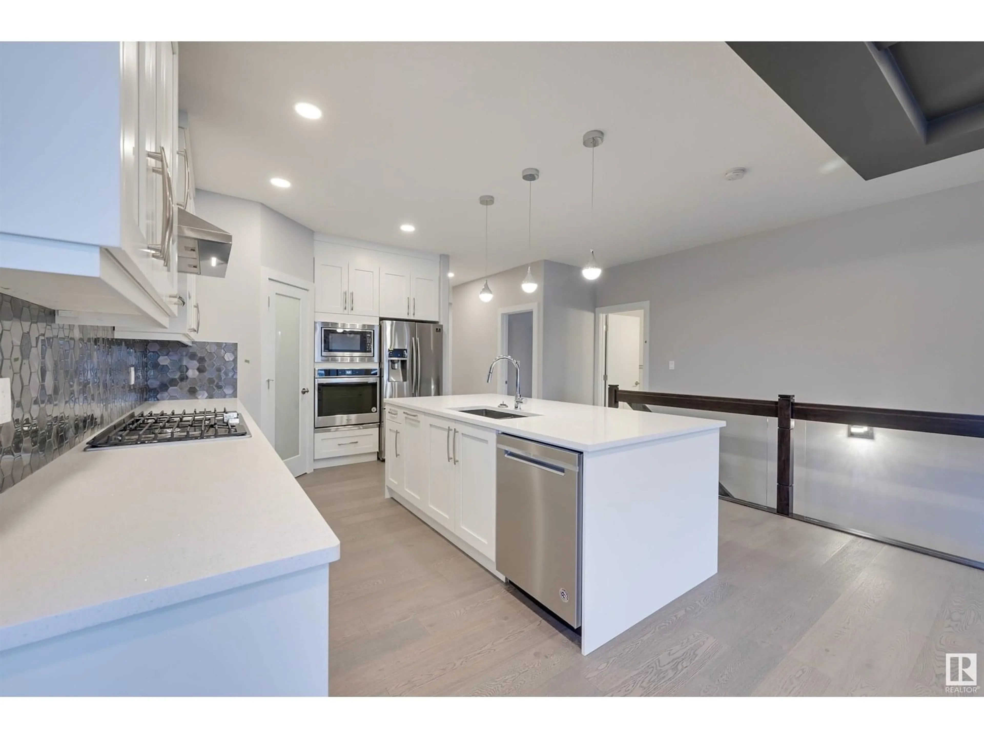 Open concept kitchen, ceramic/tile floor for 28 CANNES CV, St. Albert Alberta T8T2C6