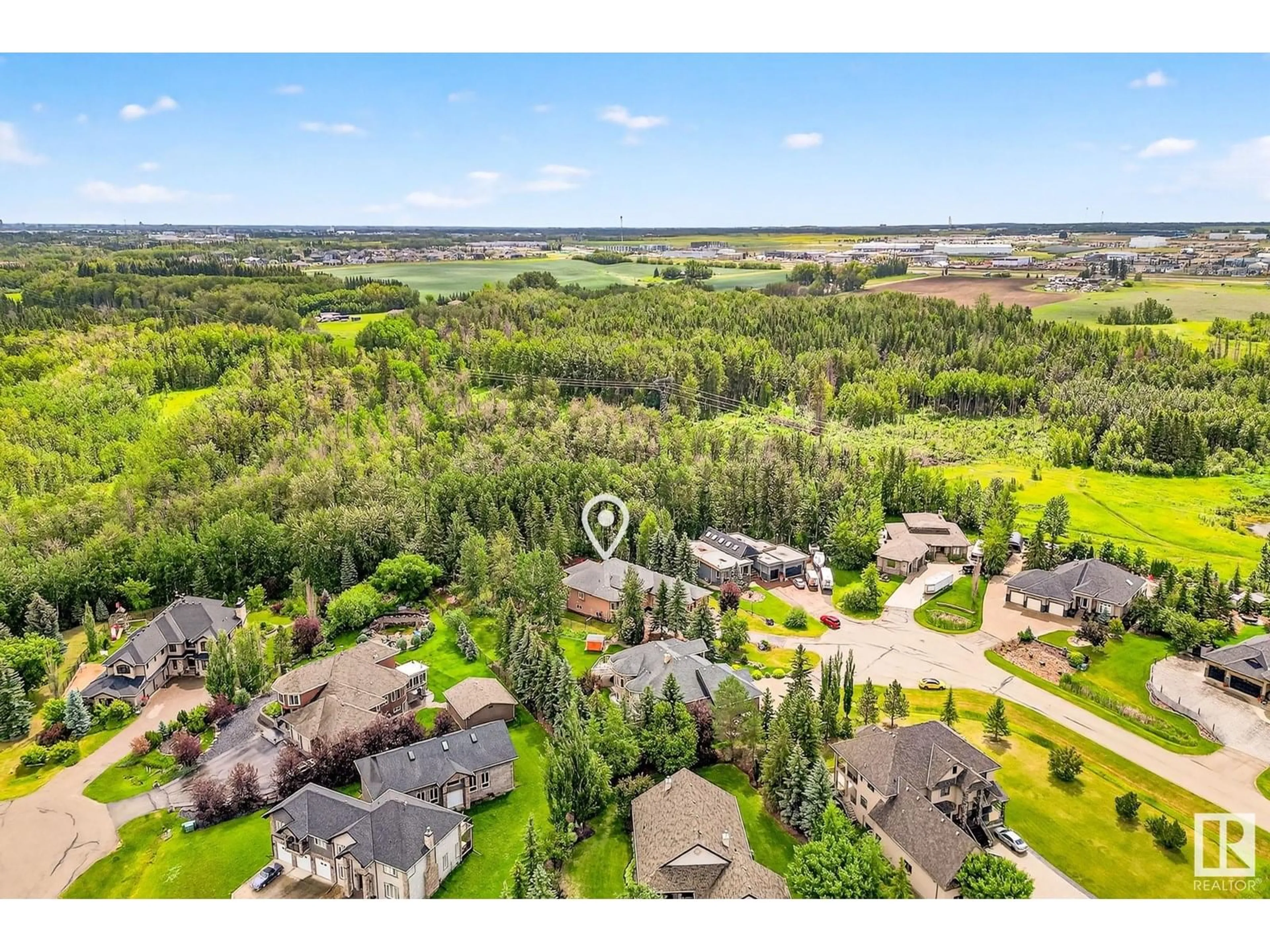 A pic from outside/outdoor area/front of a property/back of a property/a pic from drone, unknown for 61 53217 RGE ROAD 263, Rural Parkland County Alberta T7X3G2
