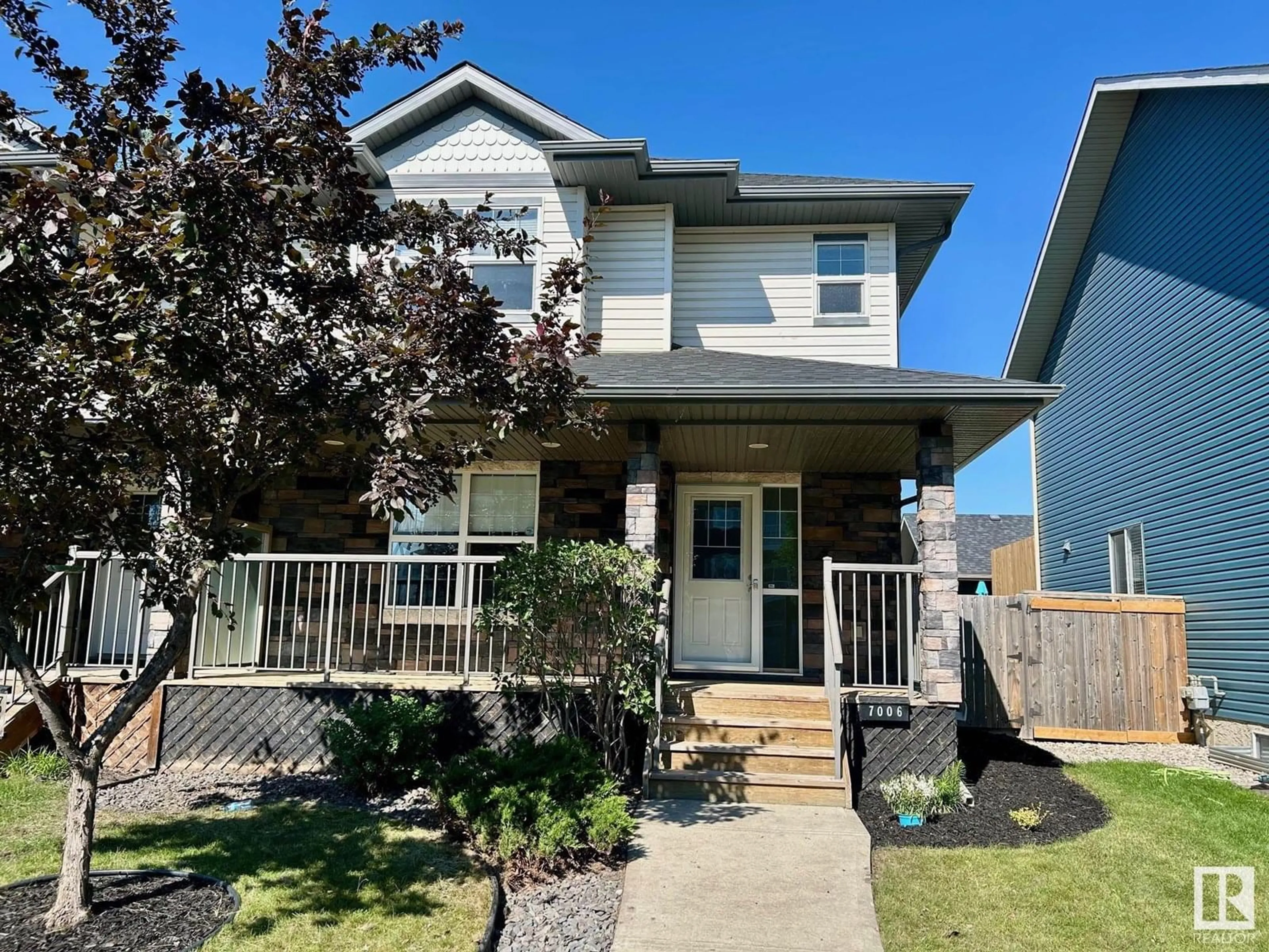 Home with vinyl exterior material, street for 7006 ETON BV, Sherwood Park Alberta T8H0L7