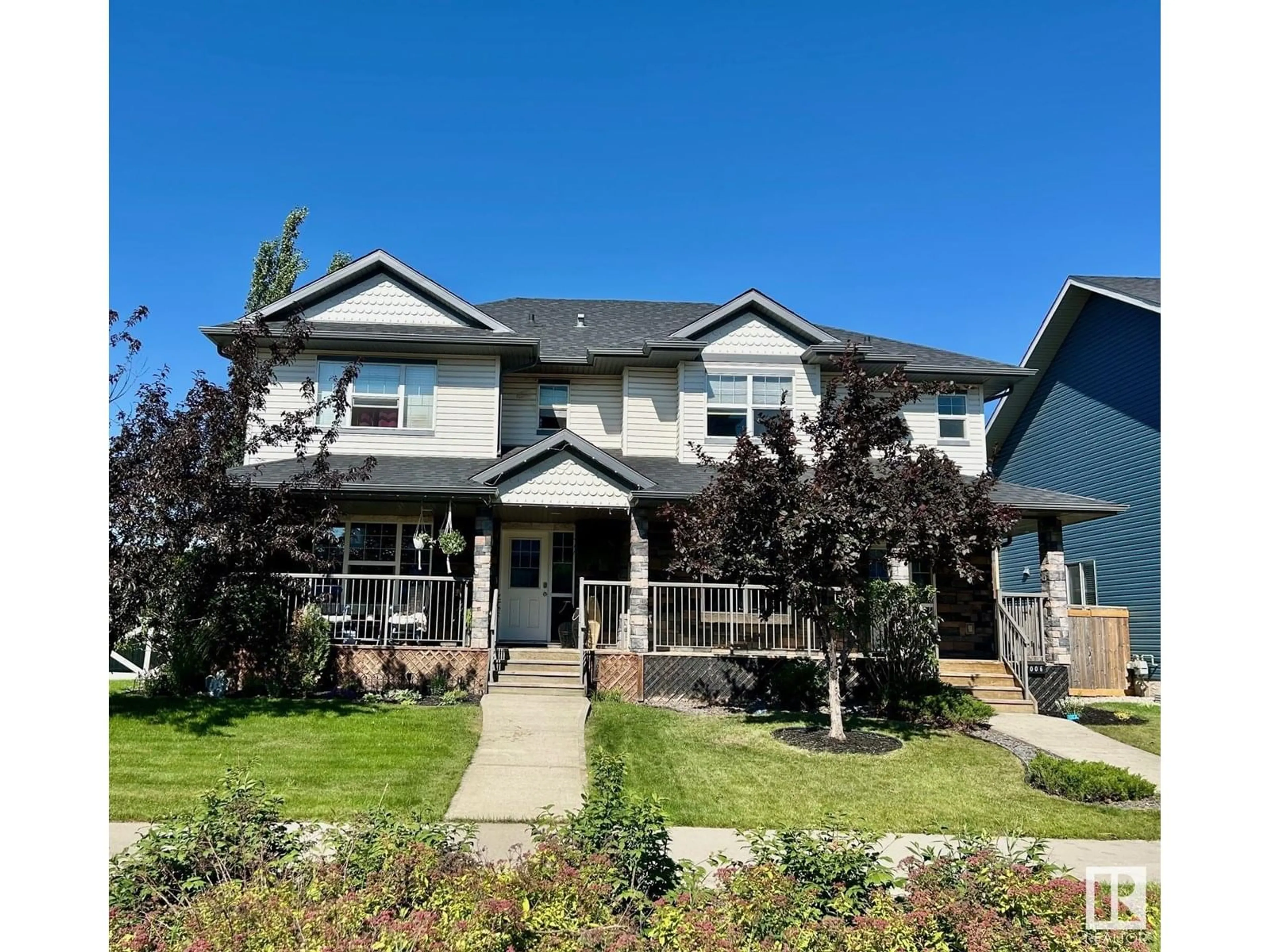 Home with vinyl exterior material, street for 7006 ETON BV, Sherwood Park Alberta T8H0L7