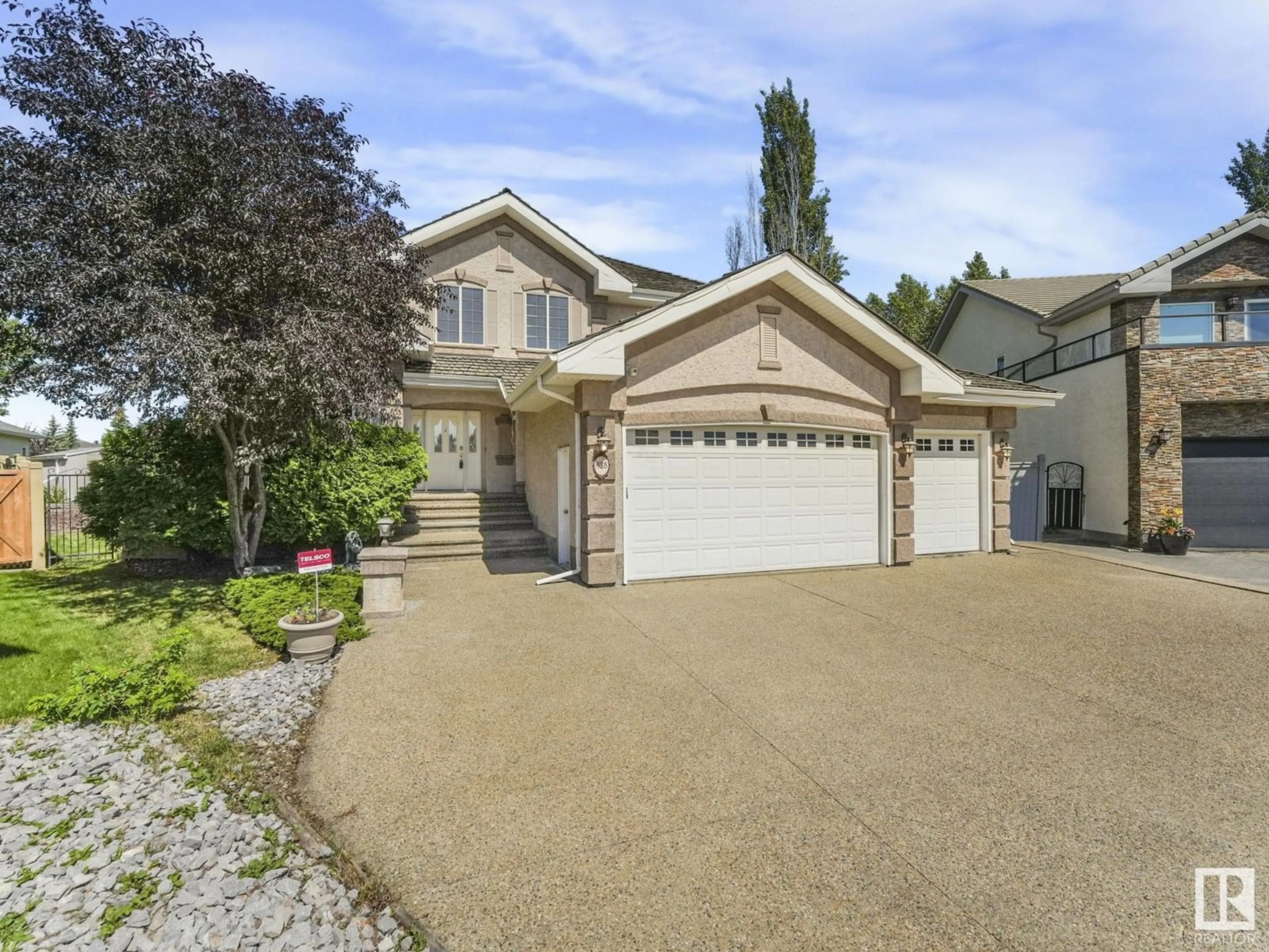 Home with vinyl exterior material, street for 328 WHISTON CL, Edmonton Alberta T6M2C7