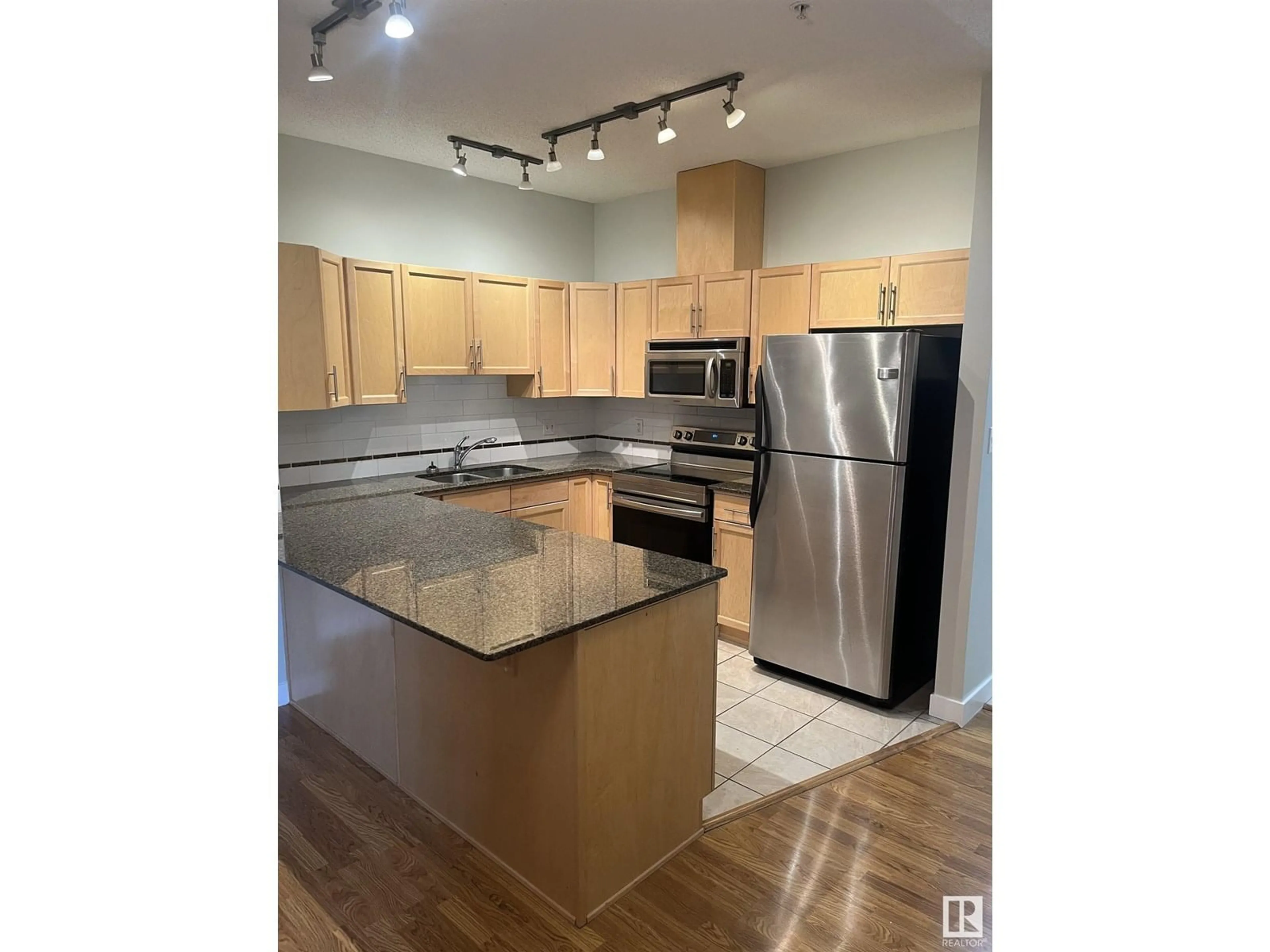 Open concept kitchen, unknown for 110 - 10333 112 ST NW, Edmonton Alberta T5K0B4