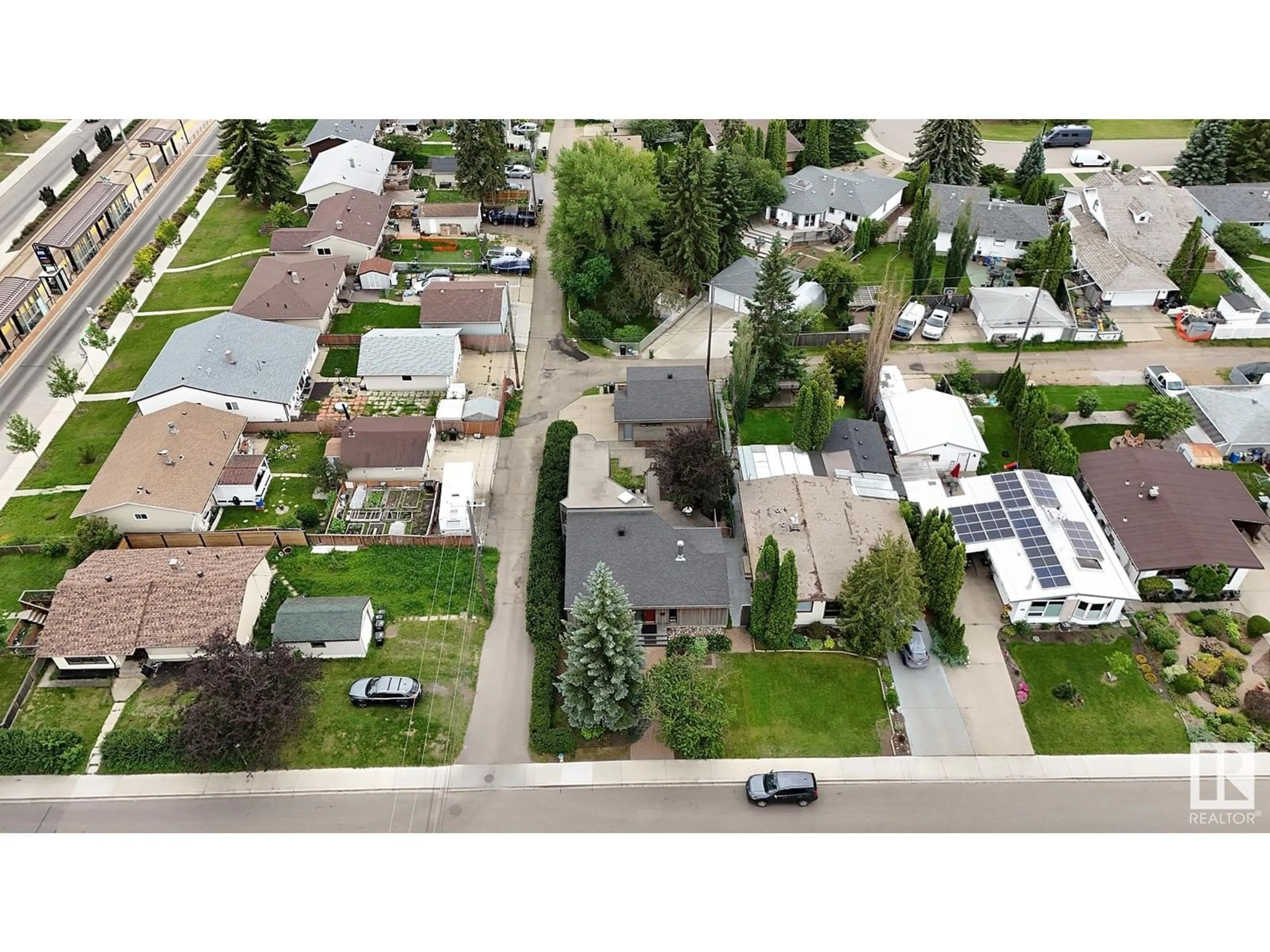 A pic from outside/outdoor area/front of a property/back of a property/a pic from drone, street for 8307 73 AV, Edmonton Alberta T6C0E1