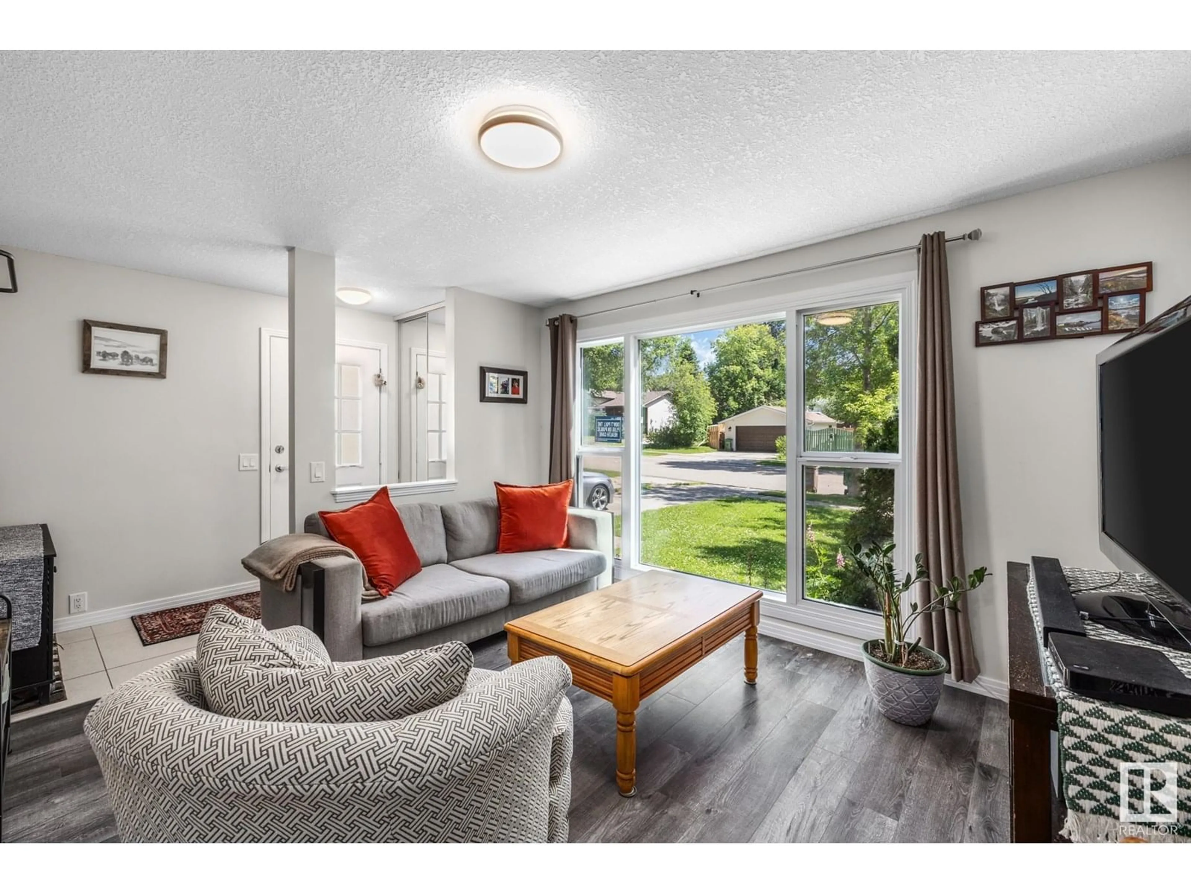 Living room with furniture, wood/laminate floor for 4 WAVERLY DR, St. Albert Alberta T8N3N4