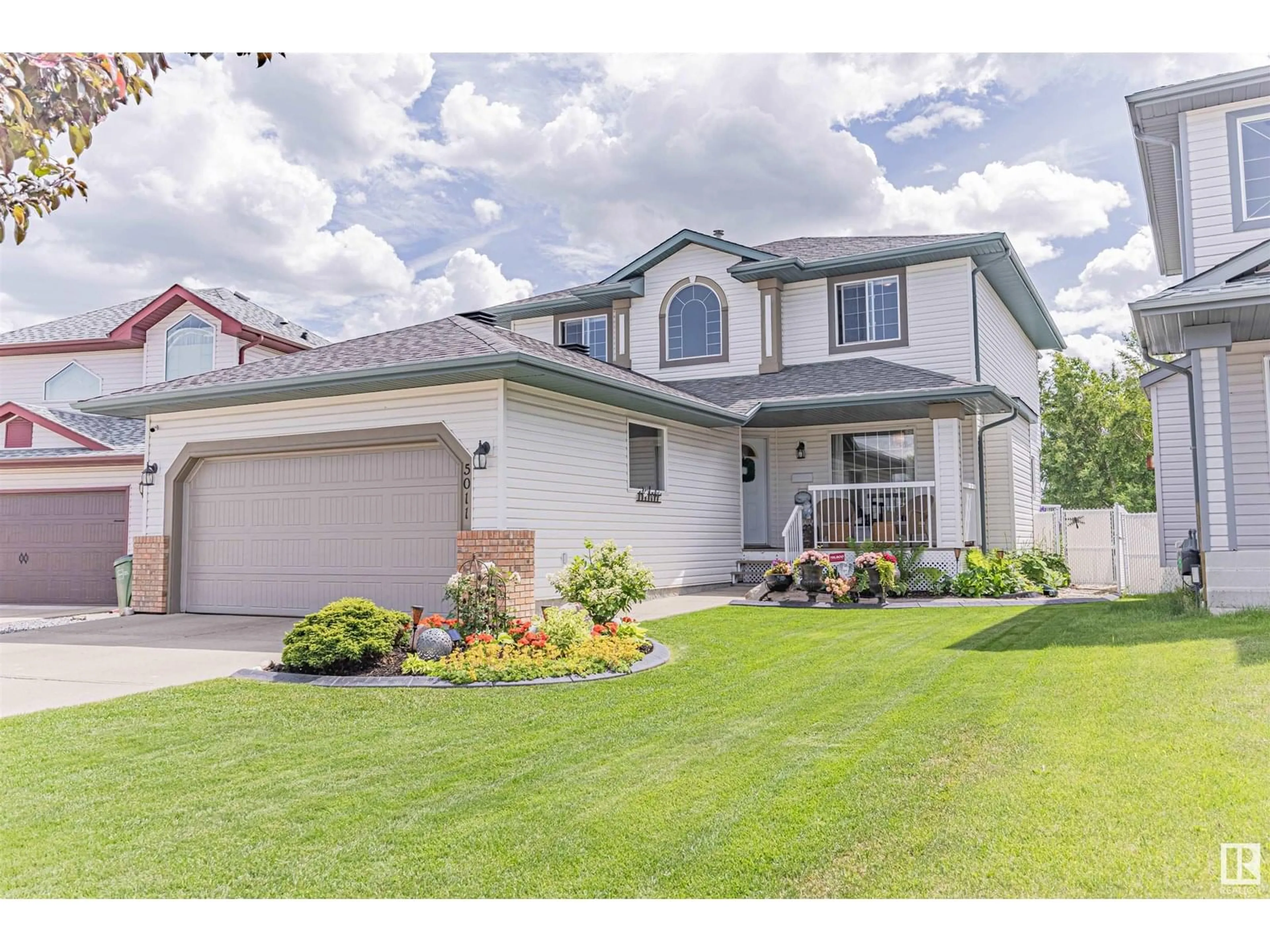Home with vinyl exterior material, street for 5011 152A AV, Edmonton Alberta T5A5E7