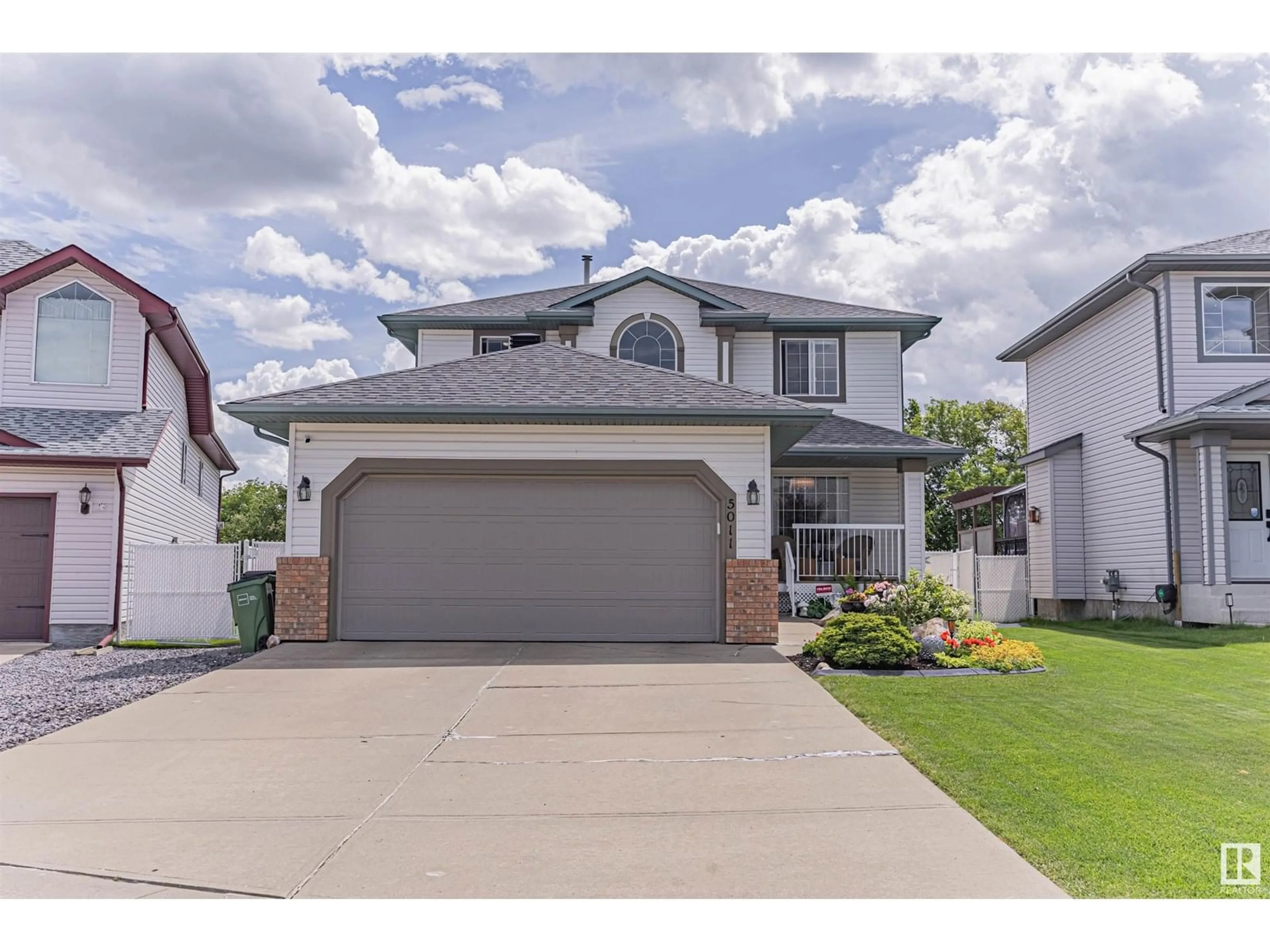 Home with vinyl exterior material, street for 5011 152A AV, Edmonton Alberta T5A5E7