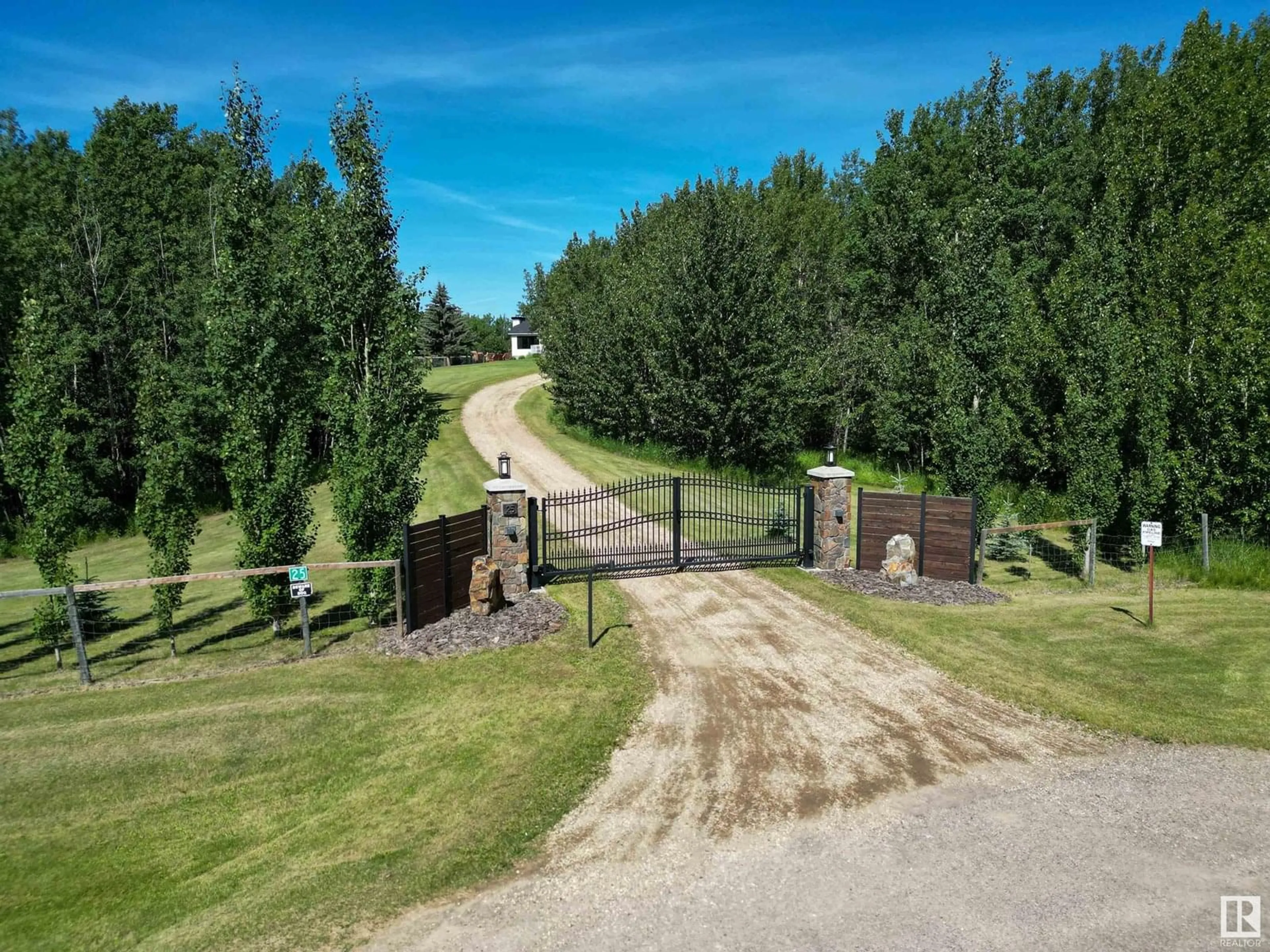 A pic from outside/outdoor area/front of a property/back of a property/a pic from drone, unknown for 54020 - 25 HGHWAY 779, Rural Parkland County Alberta T7Y0A3