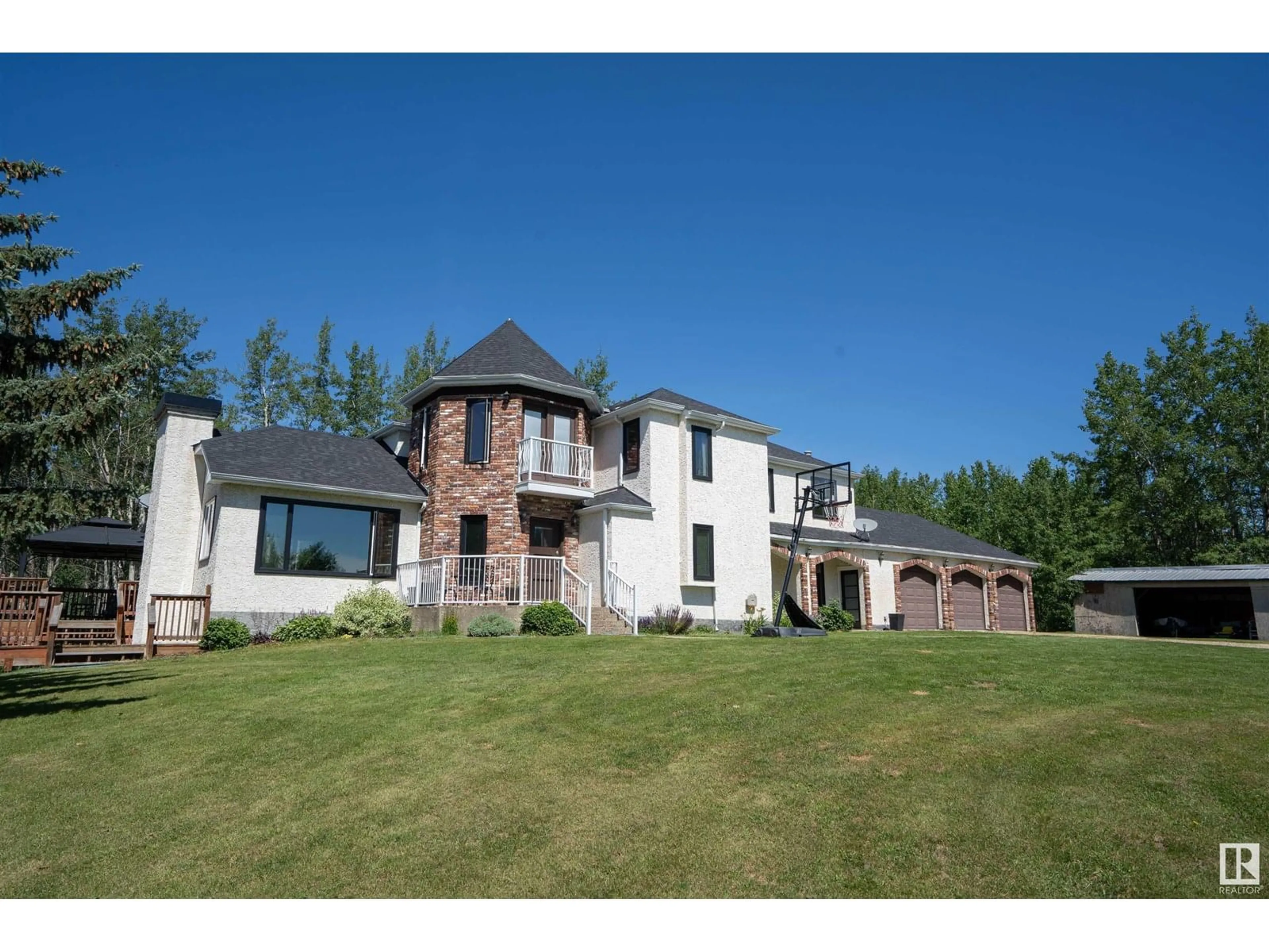 A pic from outside/outdoor area/front of a property/back of a property/a pic from drone, unknown for 54020 - 25 HGHWAY 779, Rural Parkland County Alberta T7Y0A3