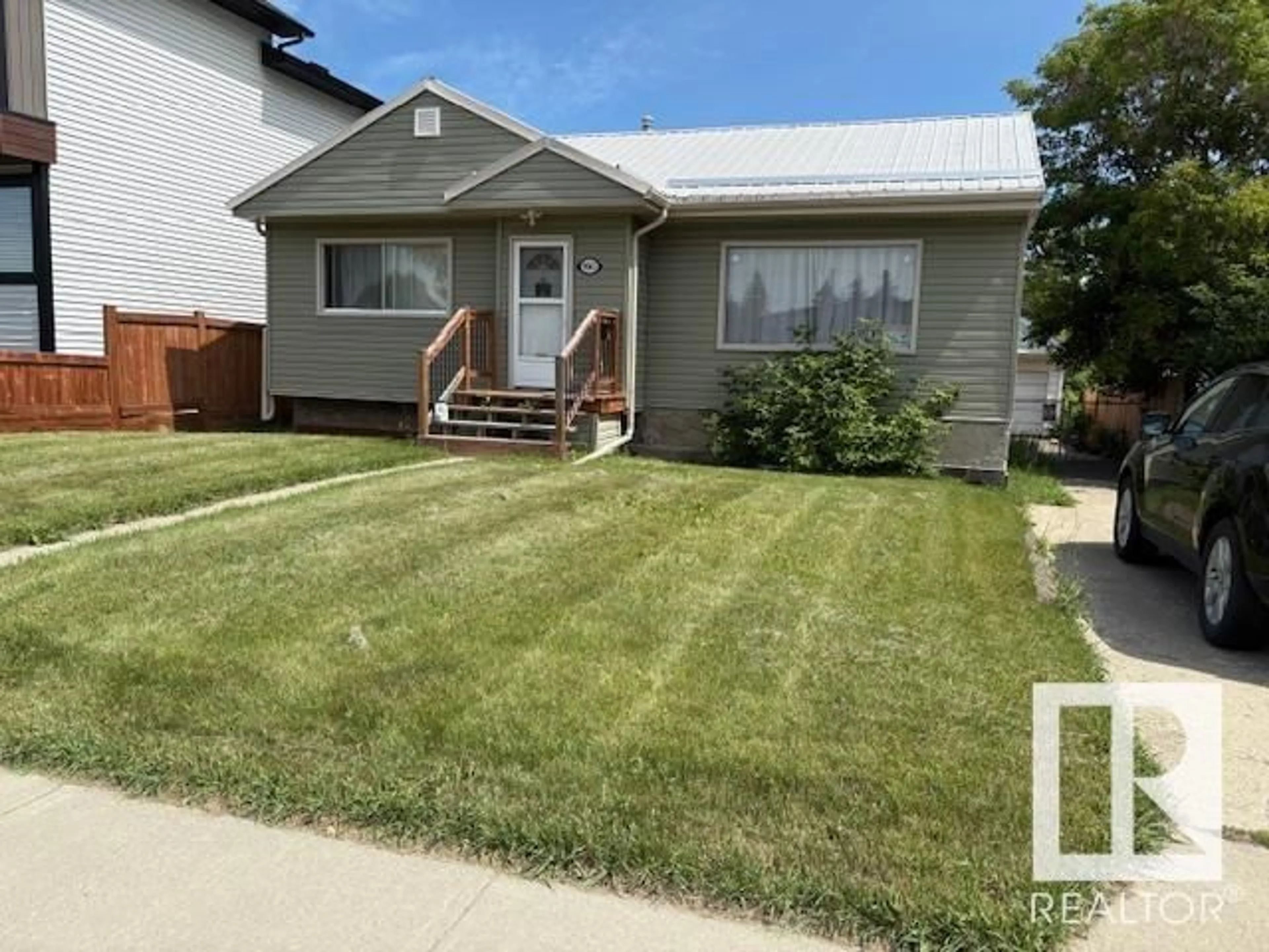 Home with vinyl exterior material, street for NW - 9041 151 ST, Edmonton Alberta T5R1J4