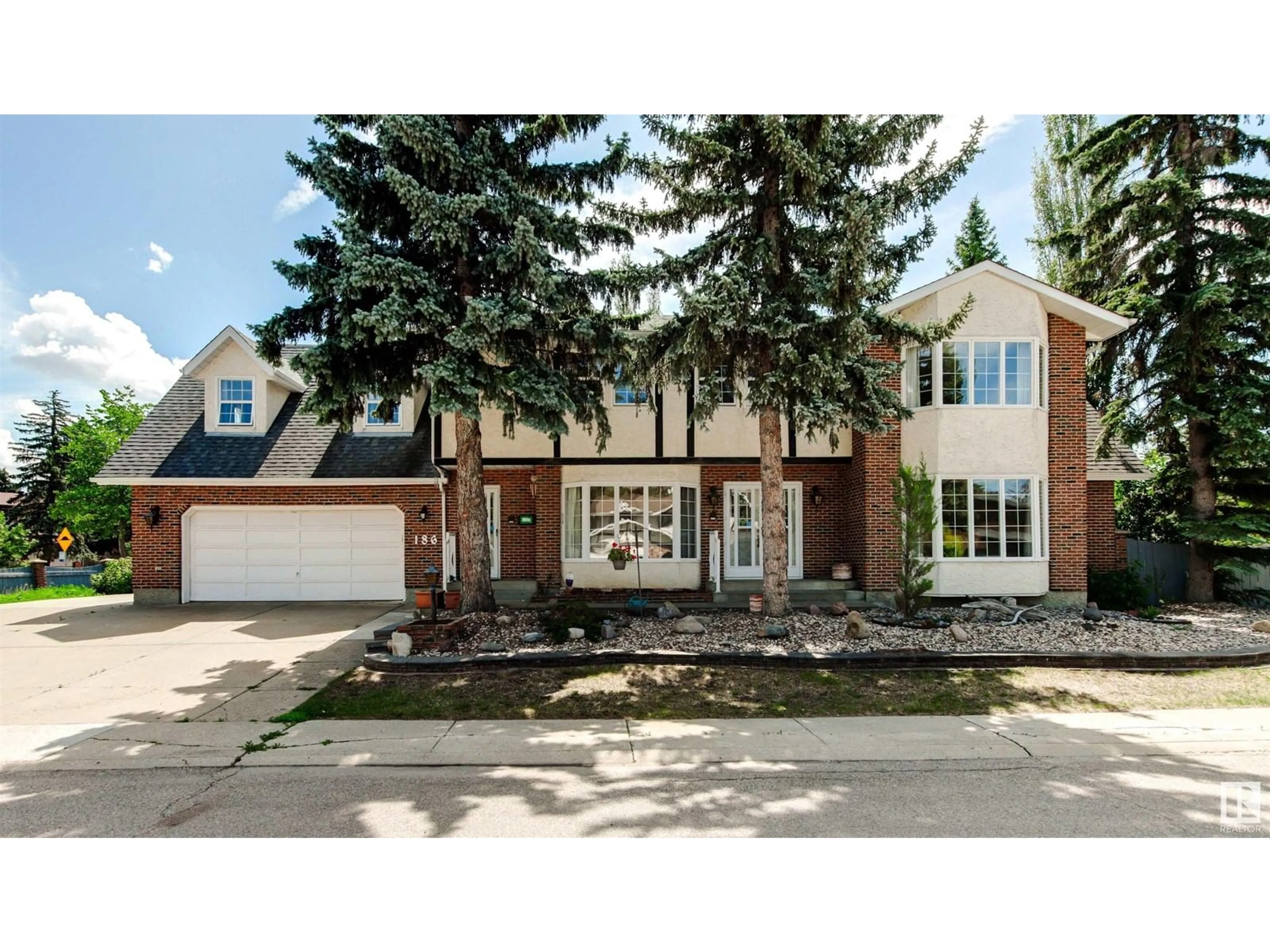 Home with brick exterior material, street for 186 WILLOW WY, Edmonton Alberta T5T1C8