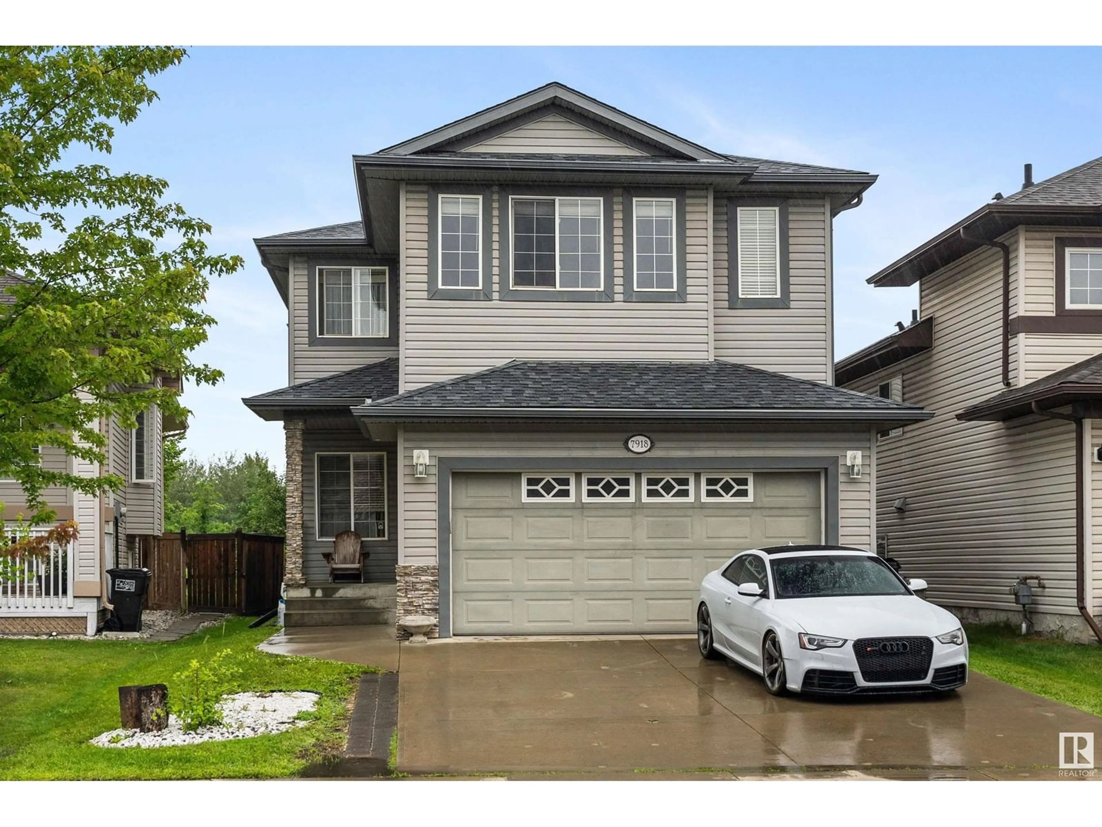 Home with vinyl exterior material, street for 7918 7 AV, Edmonton Alberta T6X1N3