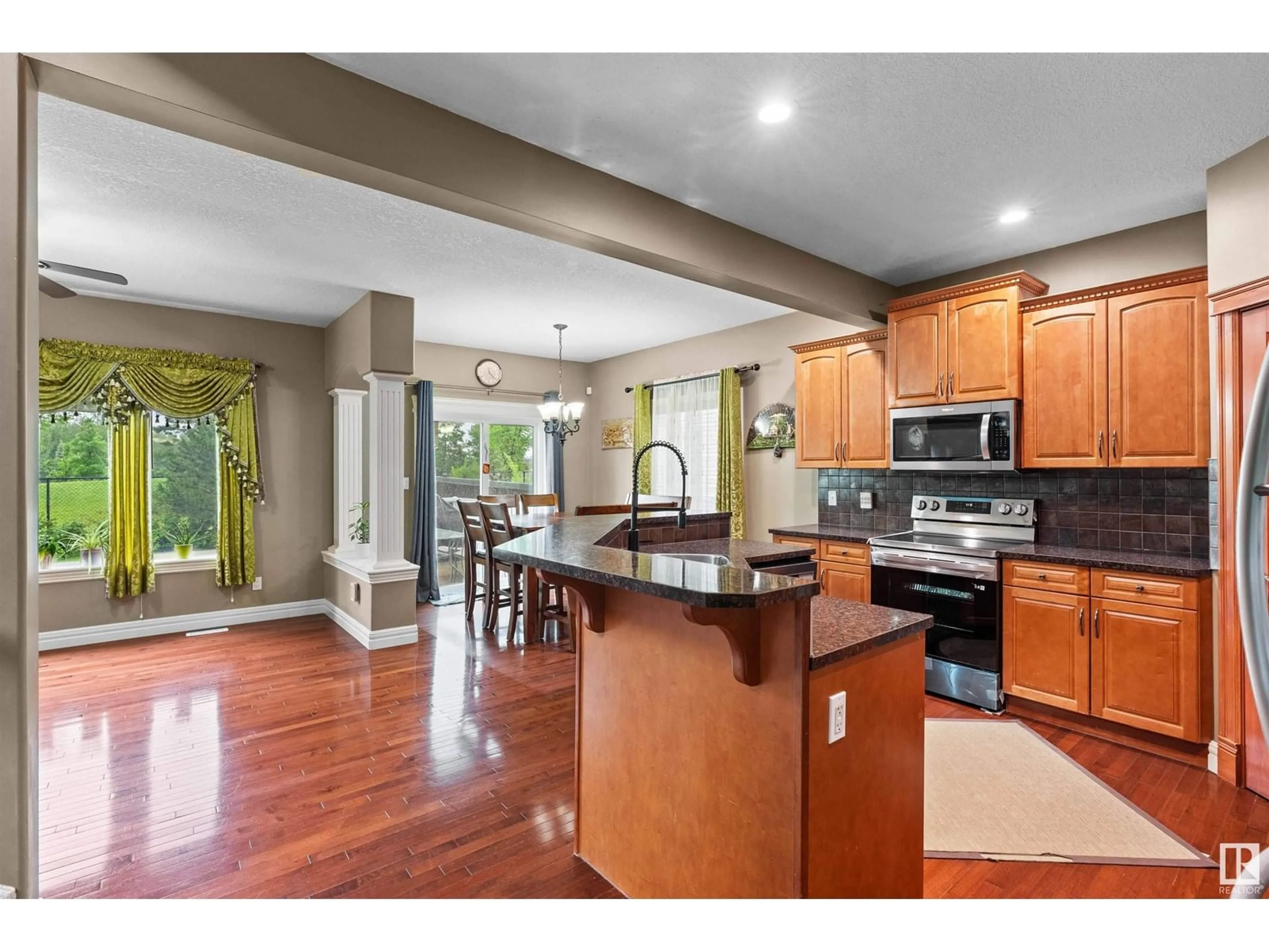 Open concept kitchen, unknown for 7918 7 AV, Edmonton Alberta T6X1N3