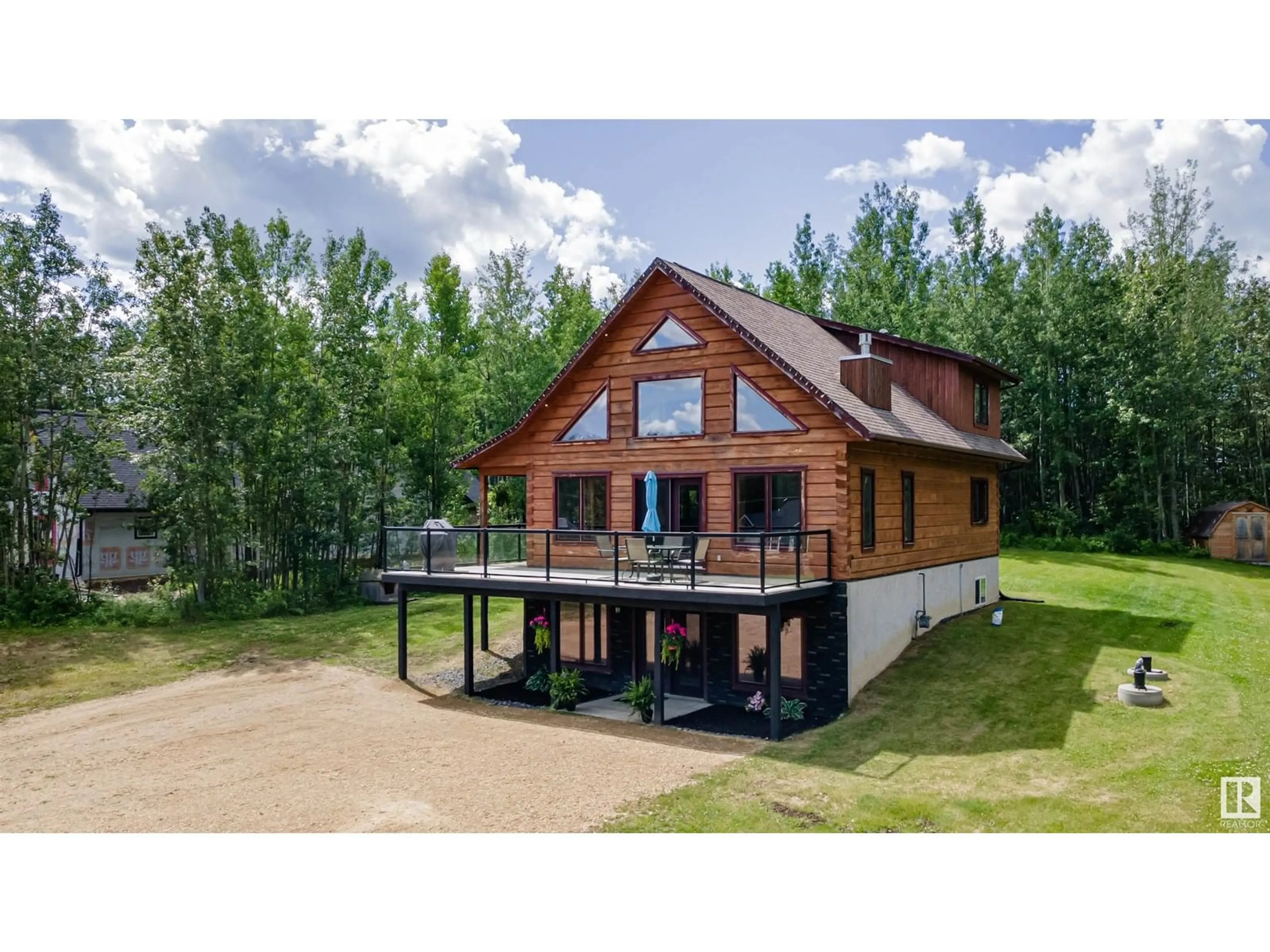 A pic from outside/outdoor area/front of a property/back of a property/a pic from drone, building for 139 - 462054 RGE ROAD 11, Rural Wetaskiwin County Alberta T0C2V0