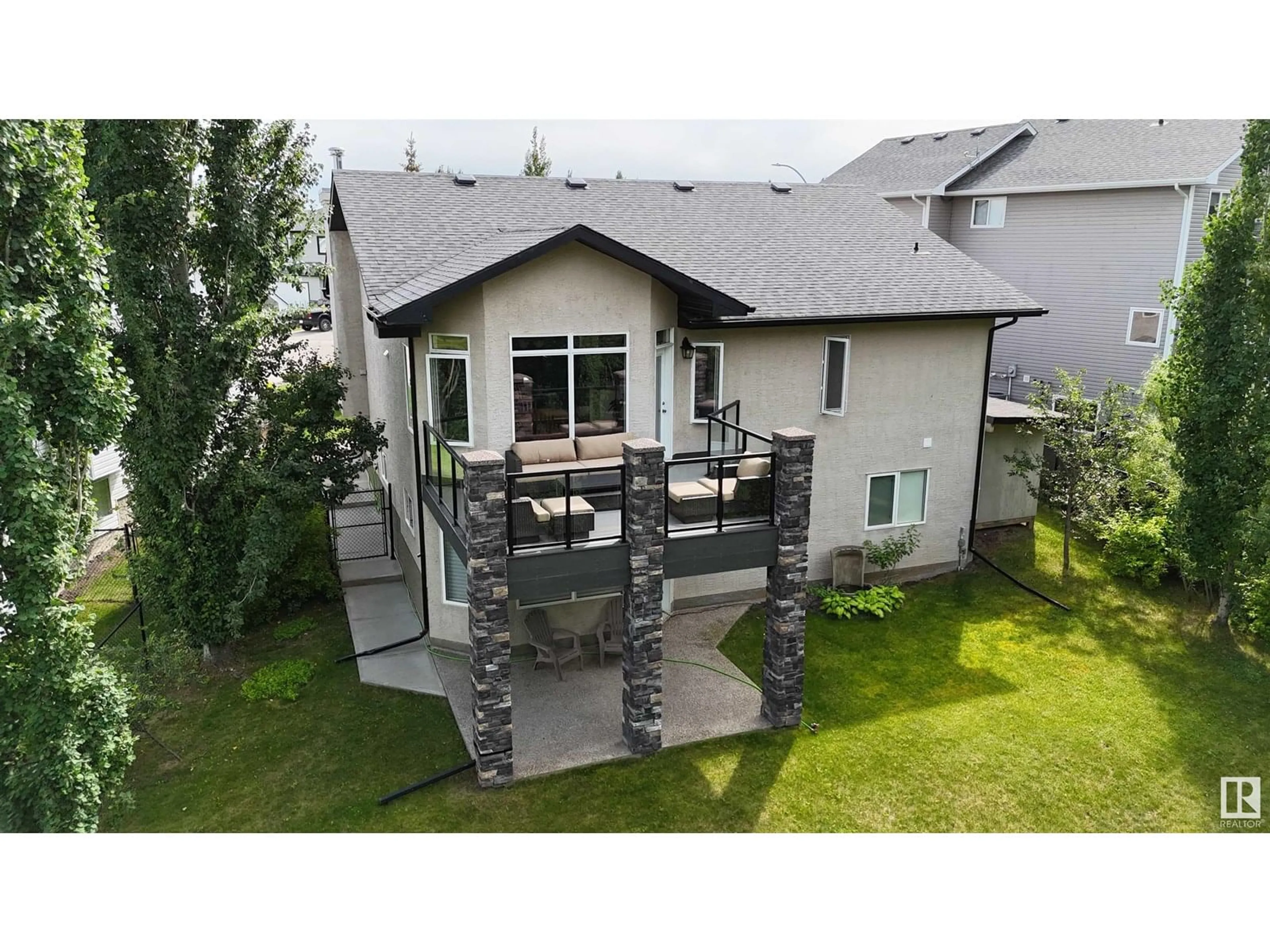 A pic from outside/outdoor area/front of a property/back of a property/a pic from drone, mountain view for 3900 47 AV, Drayton Valley Alberta T7A0A8