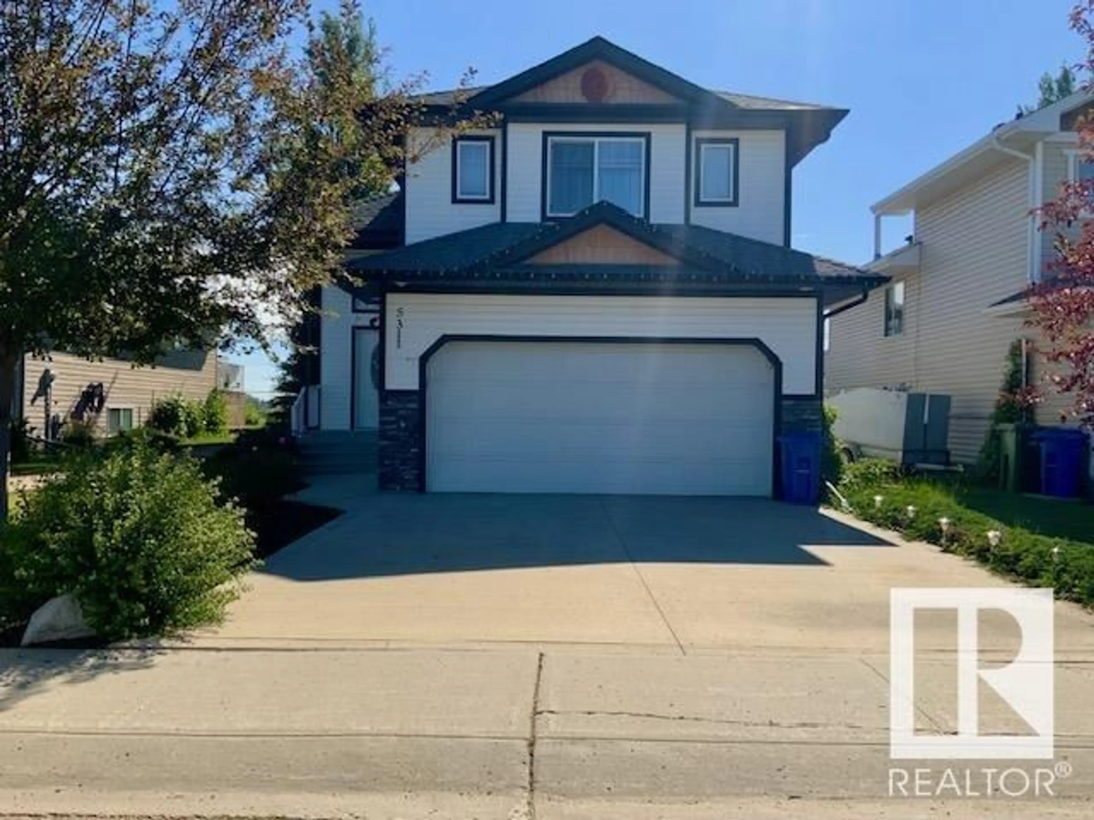 Home with vinyl exterior material, street for 5311 42 ST, Wetaskiwin Alberta T9A3T1