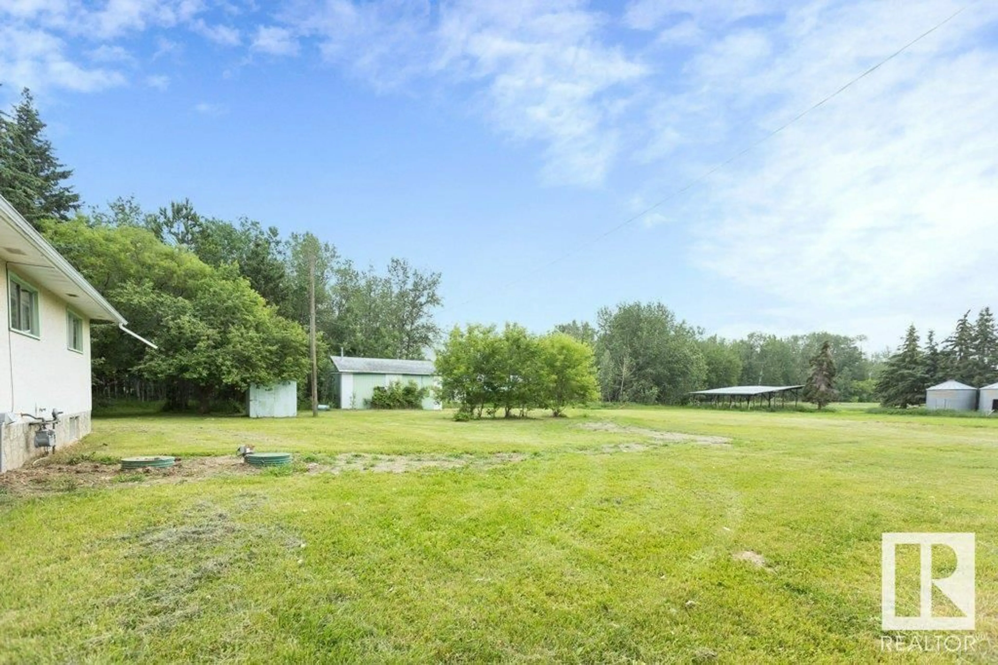A pic from outside/outdoor area/front of a property/back of a property/a pic from drone, water/lake/river/ocean view for 64223 RG RD 13, Rural Westlock County Alberta T0G0Y0
