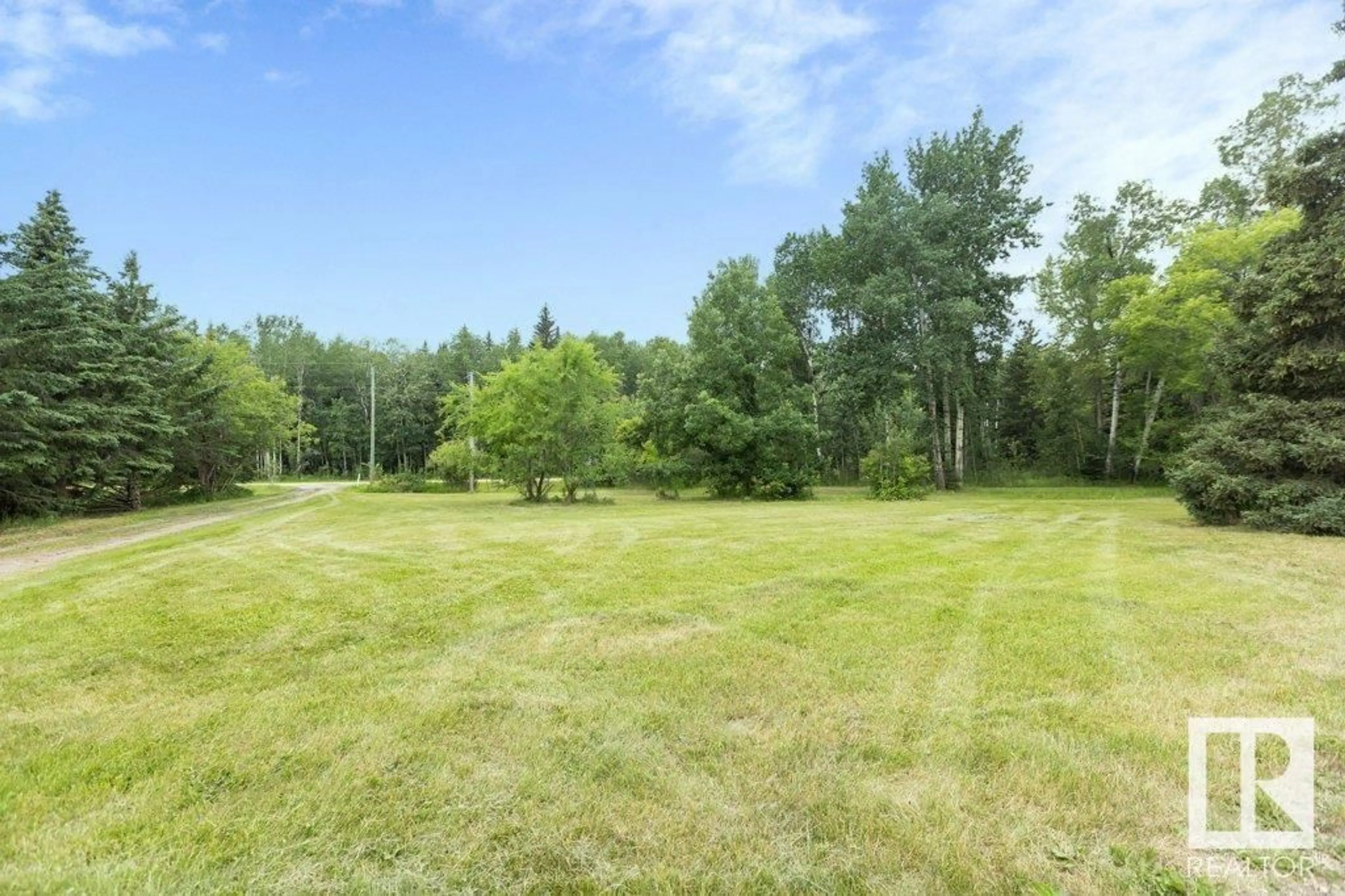 A pic from outside/outdoor area/front of a property/back of a property/a pic from drone, forest/trees view for 64223 RG RD 13, Rural Westlock County Alberta T0G0Y0