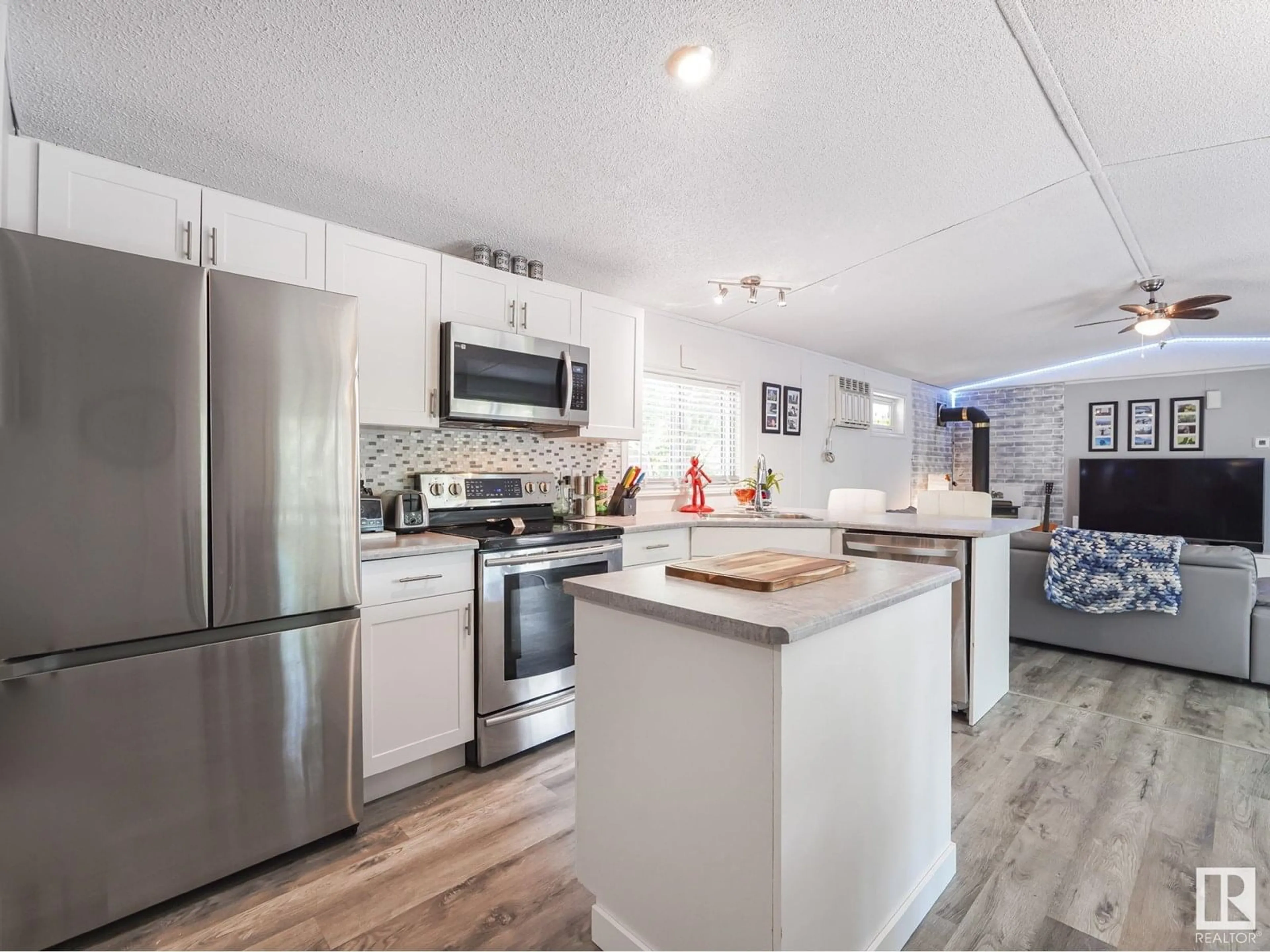 Open concept kitchen, unknown for 304 57323 RGRD 30, Rural Barrhead County Alberta T7N1N4