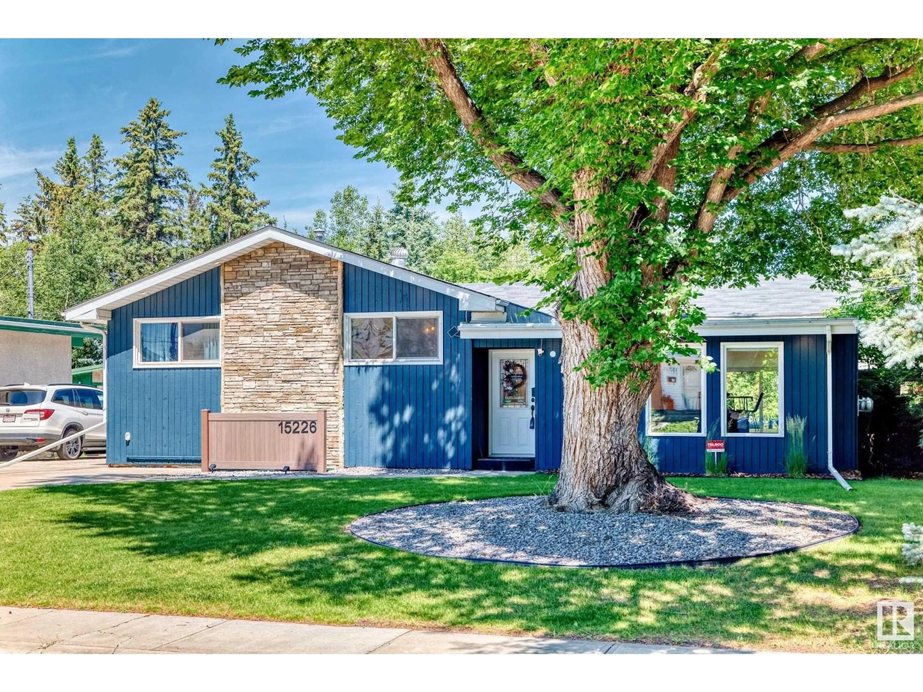Home with vinyl exterior material, street for 15226 81 AV, Edmonton Alberta T5R3P1