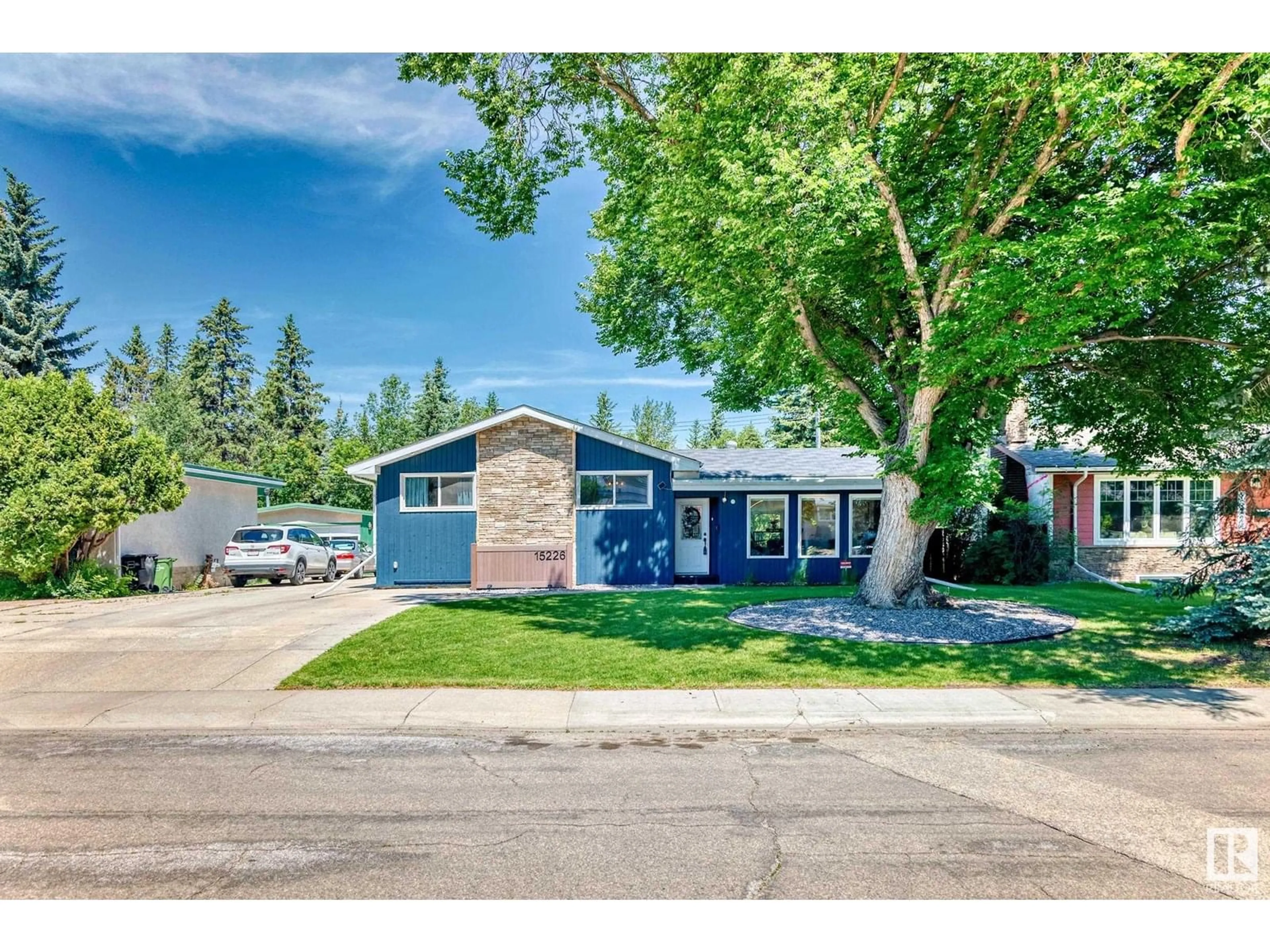 Home with vinyl exterior material, street for 15226 81 AV, Edmonton Alberta T5R3P1