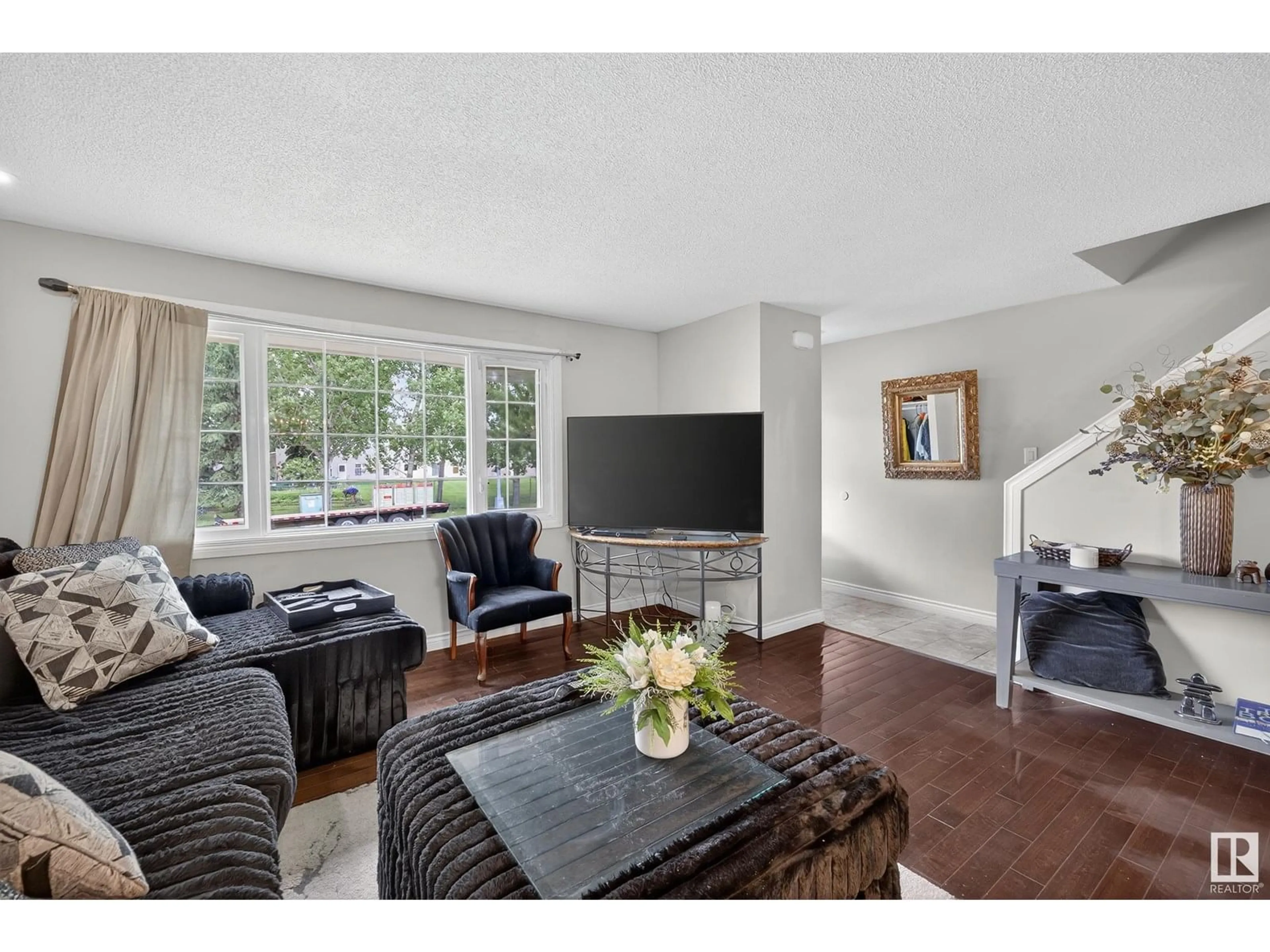 Living room with furniture, unknown for 11447 39 AV NW, Edmonton Alberta T6J0M5
