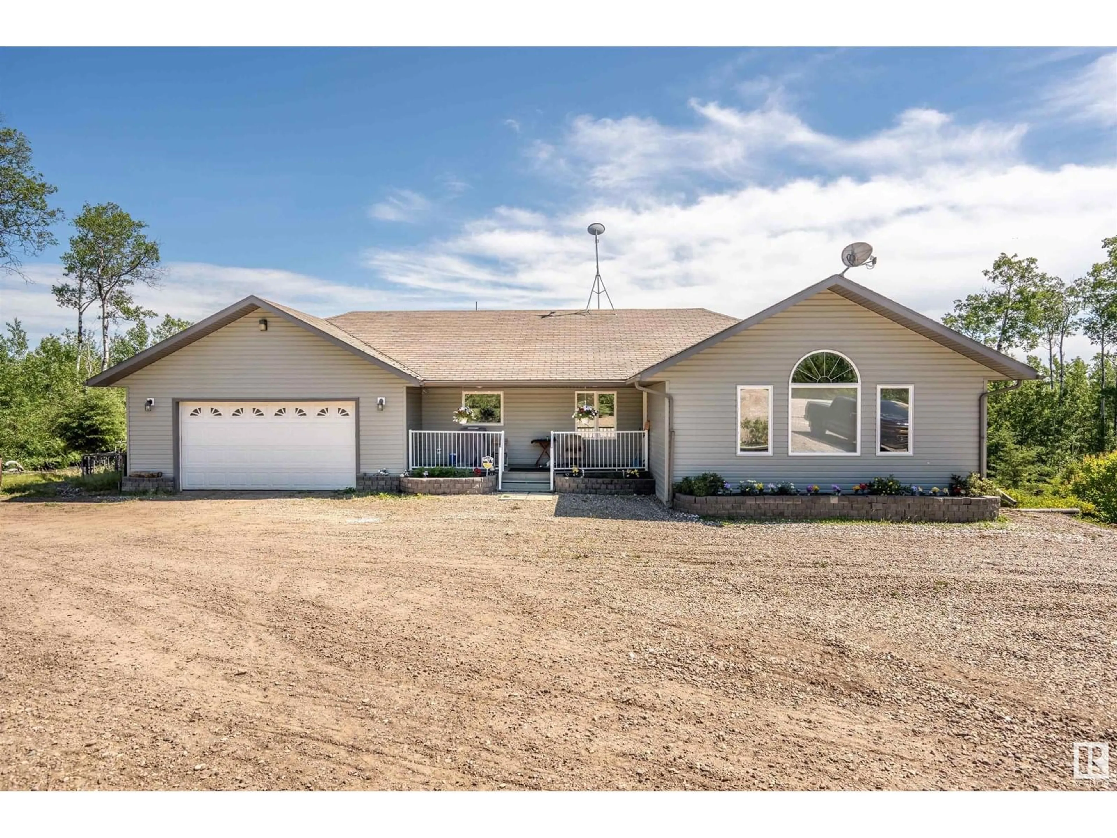 Home with vinyl exterior material, street for 62019 RANGE ROAD 421, Rural Bonnyville M.D. Alberta T9M1P2