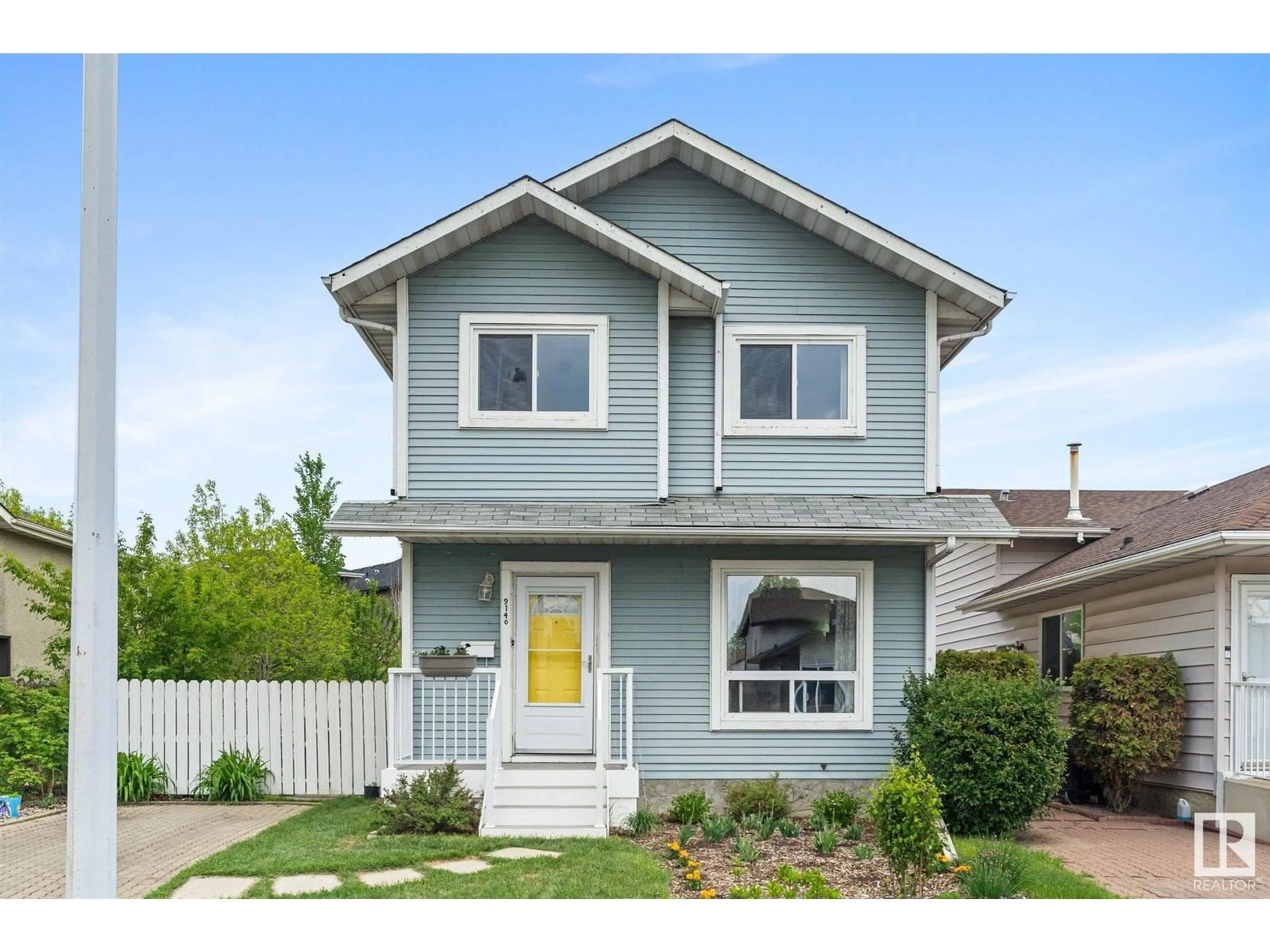 Home with vinyl exterior material, street for 9140 180A AV, Edmonton Alberta T5Z2K2