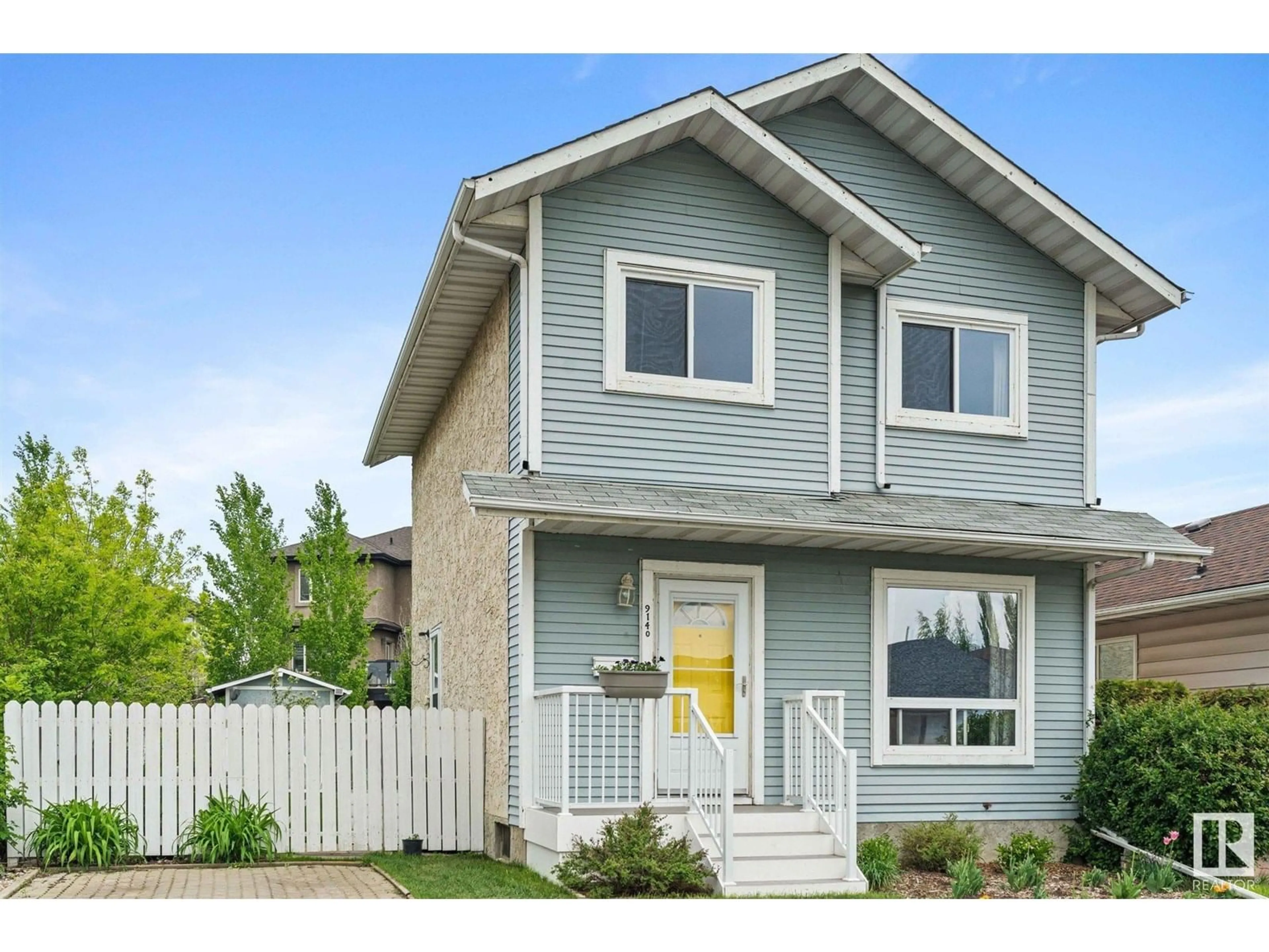 Home with vinyl exterior material, street for 9140 180A AV, Edmonton Alberta T5Z2K2