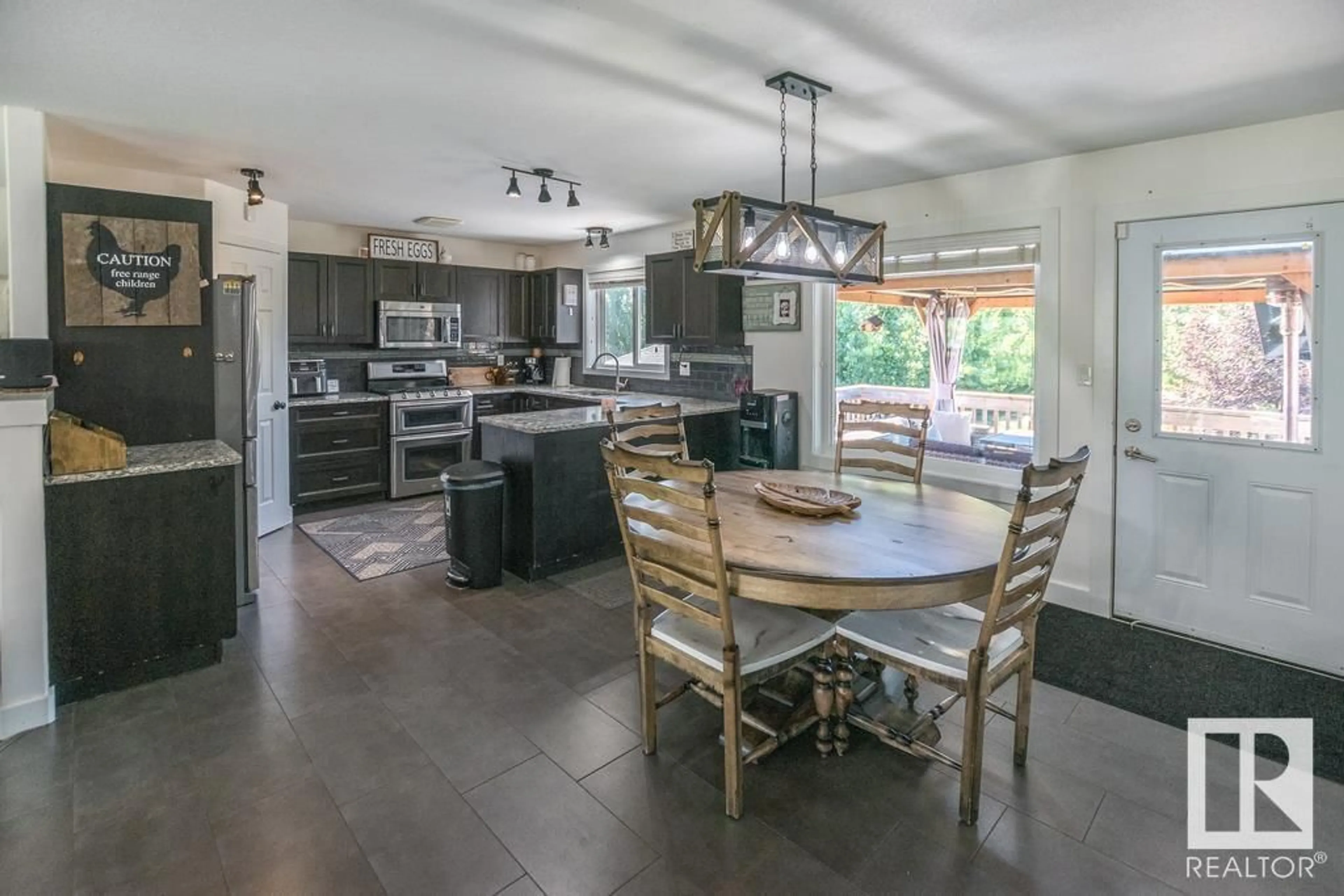 Open concept kitchen, ceramic/tile floor for 46410 - 446 TWP RD 610, Rural Bonnyville M.D. Alberta T9N1J6