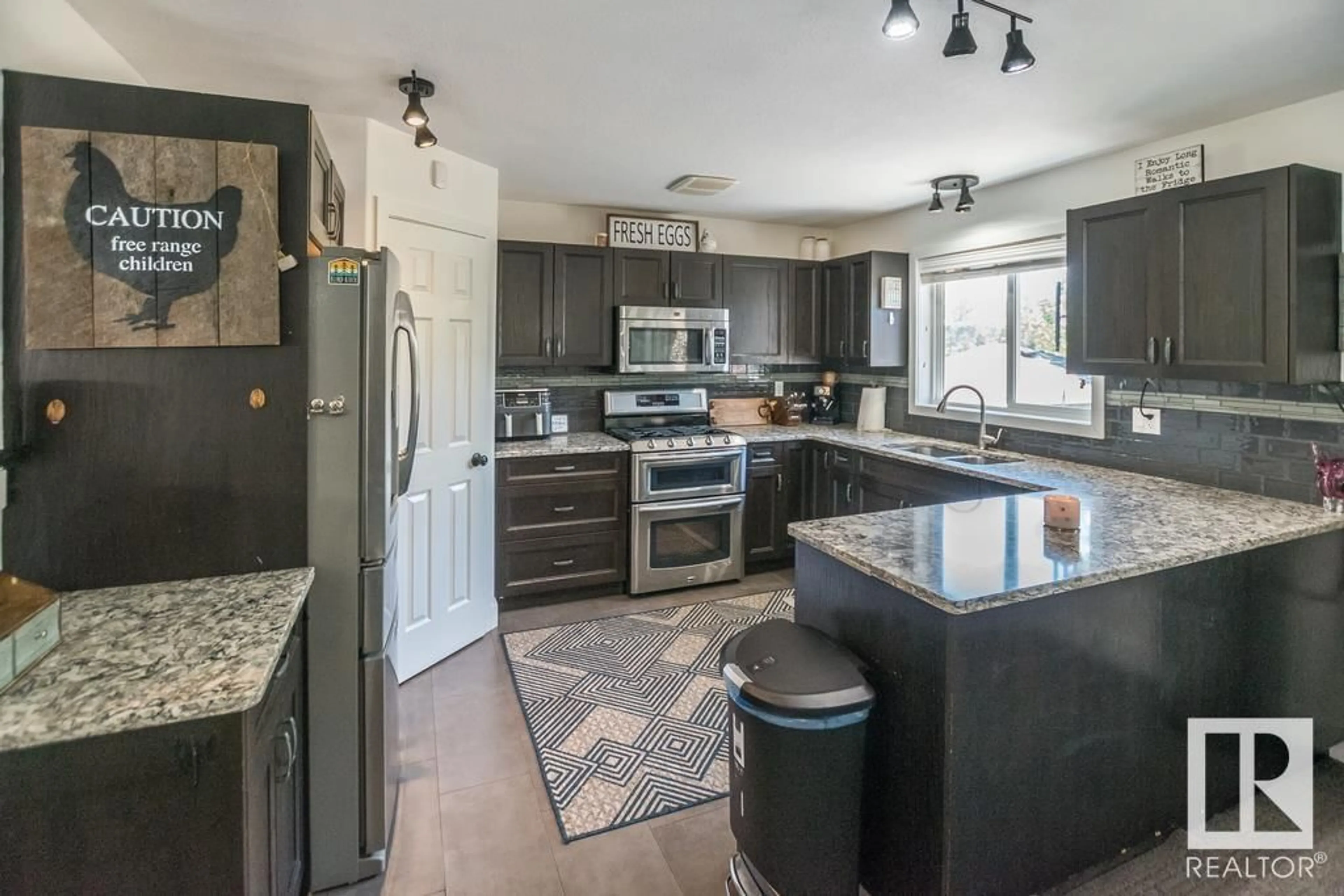Open concept kitchen, ceramic/tile floor for 46410 - 446 TWP RD 610, Rural Bonnyville M.D. Alberta T9N1J6
